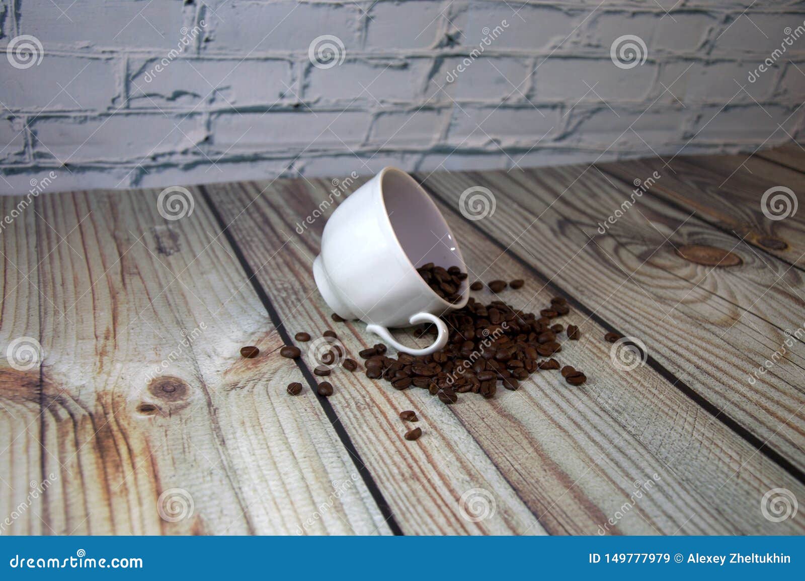 Side view of a transparent mug with coffee, with three layers