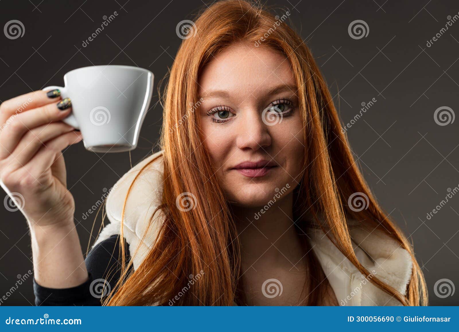 porcelain mug enhances woman's warm invite