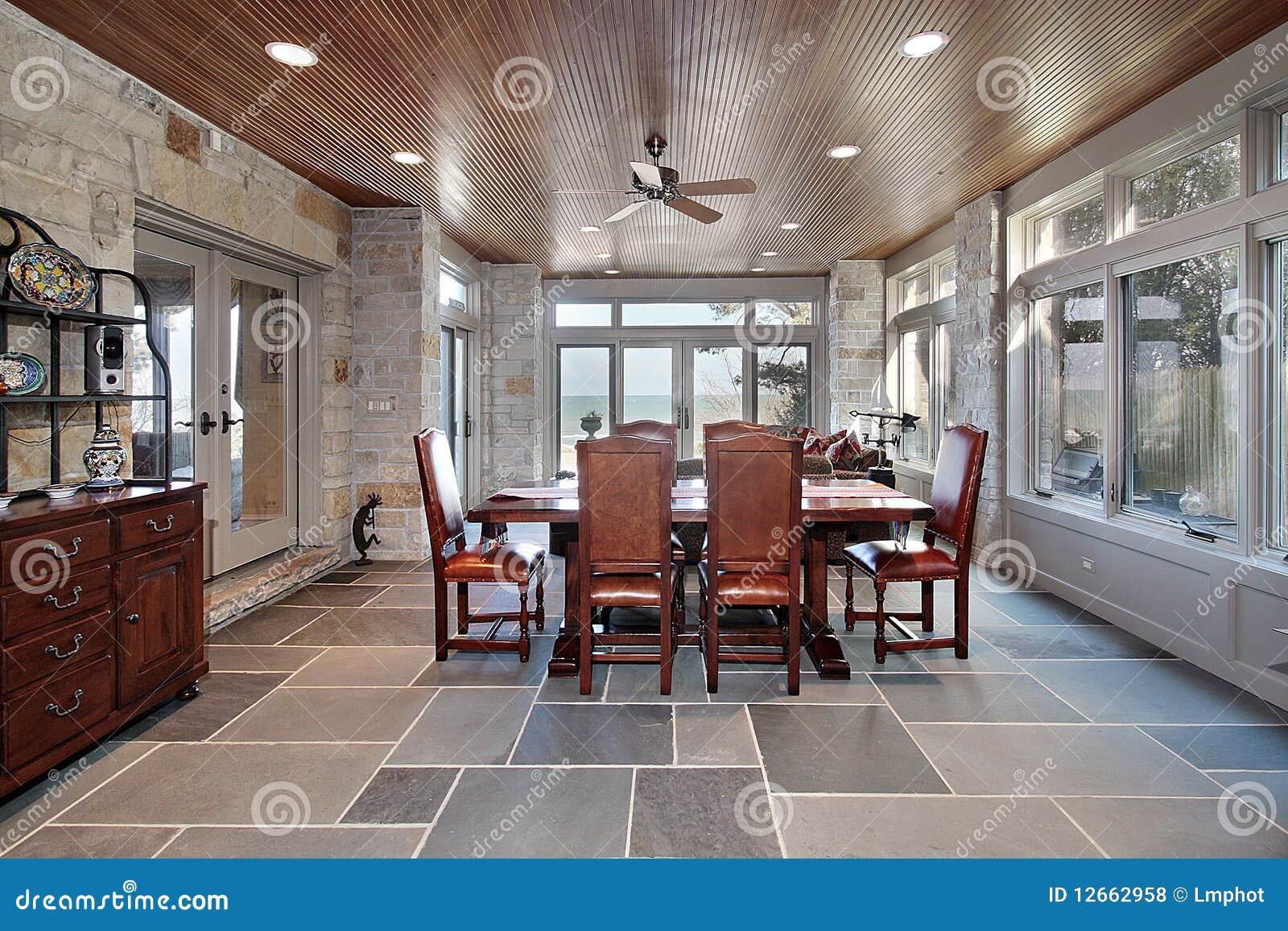 porch with stone walls and slate floors