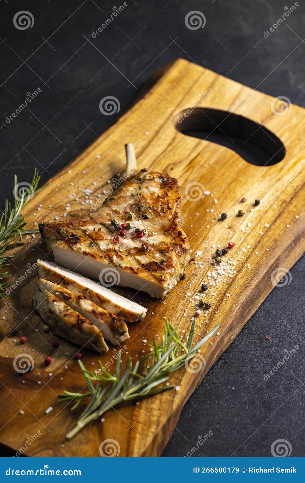 Pork Cutlet with a Bone on Rosemary and Pepper Stock Image Image of