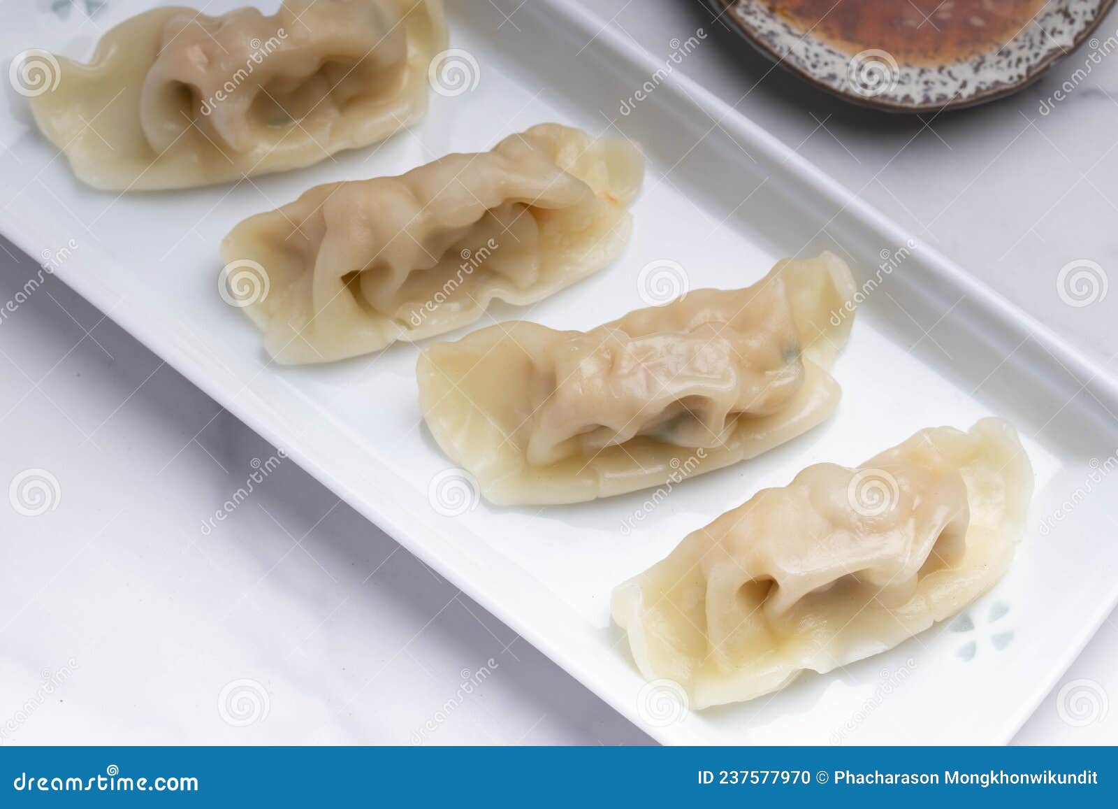 Pork Gyoza in a White Plate with Soy Sauce Stock Photo Image of gyoza, foodstuff 237577970