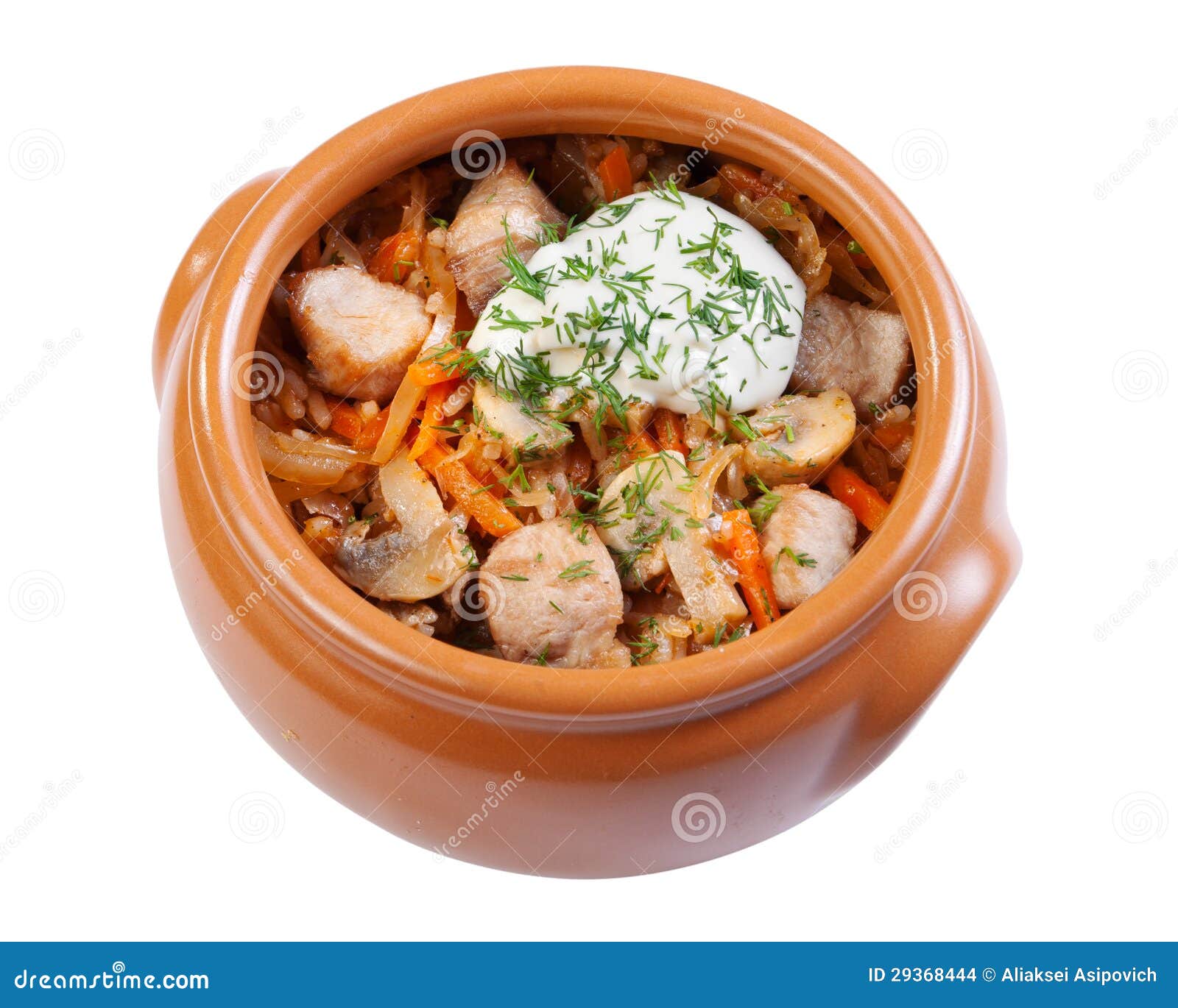 pork with mushrooms, carrots and onions in a ceramic crock pot,