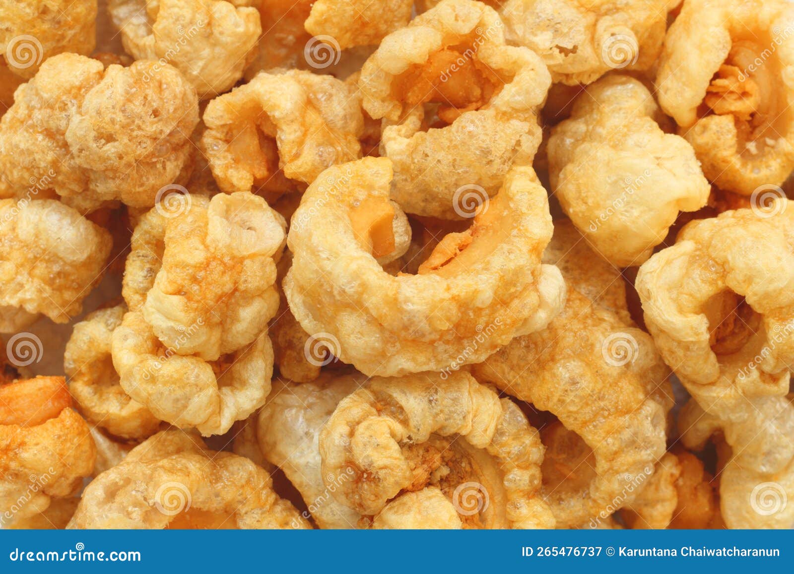 Pork Rinds Or Pork Snack Deep Fried Pork Skin Crispy And Blistered pork-rinds-or-pork-snack-deep-fried-pork-skin-crispy-and-blistered