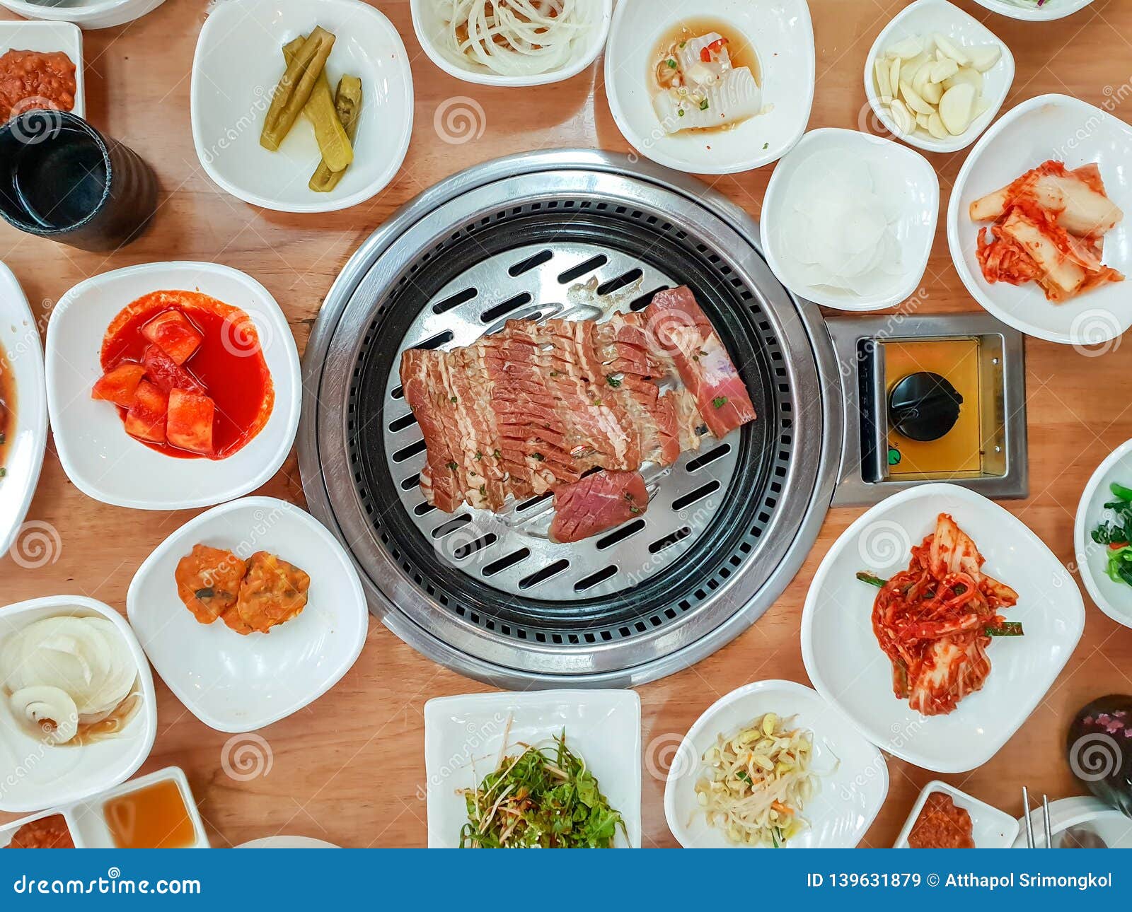 Pork Roast with Sets of Korean Side Dishes and Vegetable Stock Image