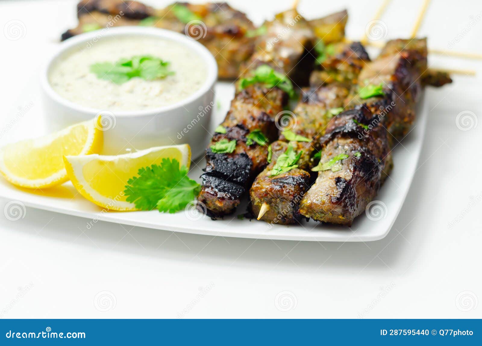 Pork Shoulder Kebabs with a Lemon and Herb Rub and a Garlic and Mint