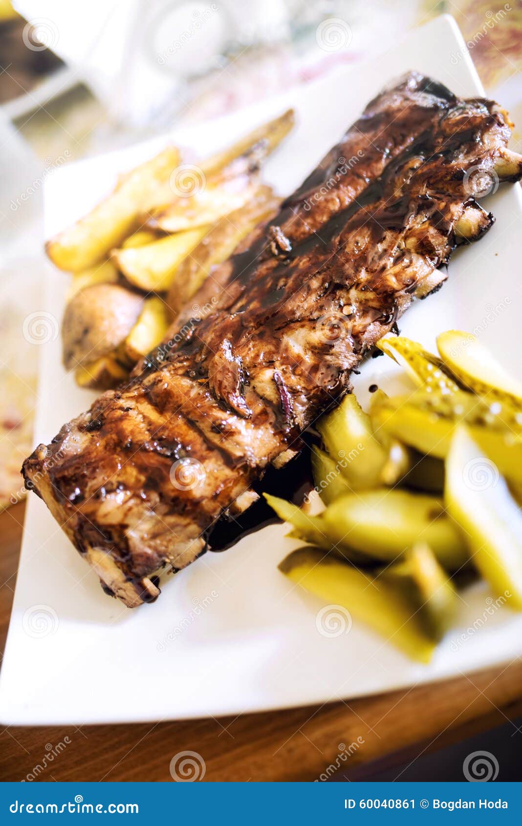 Pork Spare Ribs With Barbecue Sauce, Golden Potatoes And Pickles. Main ...