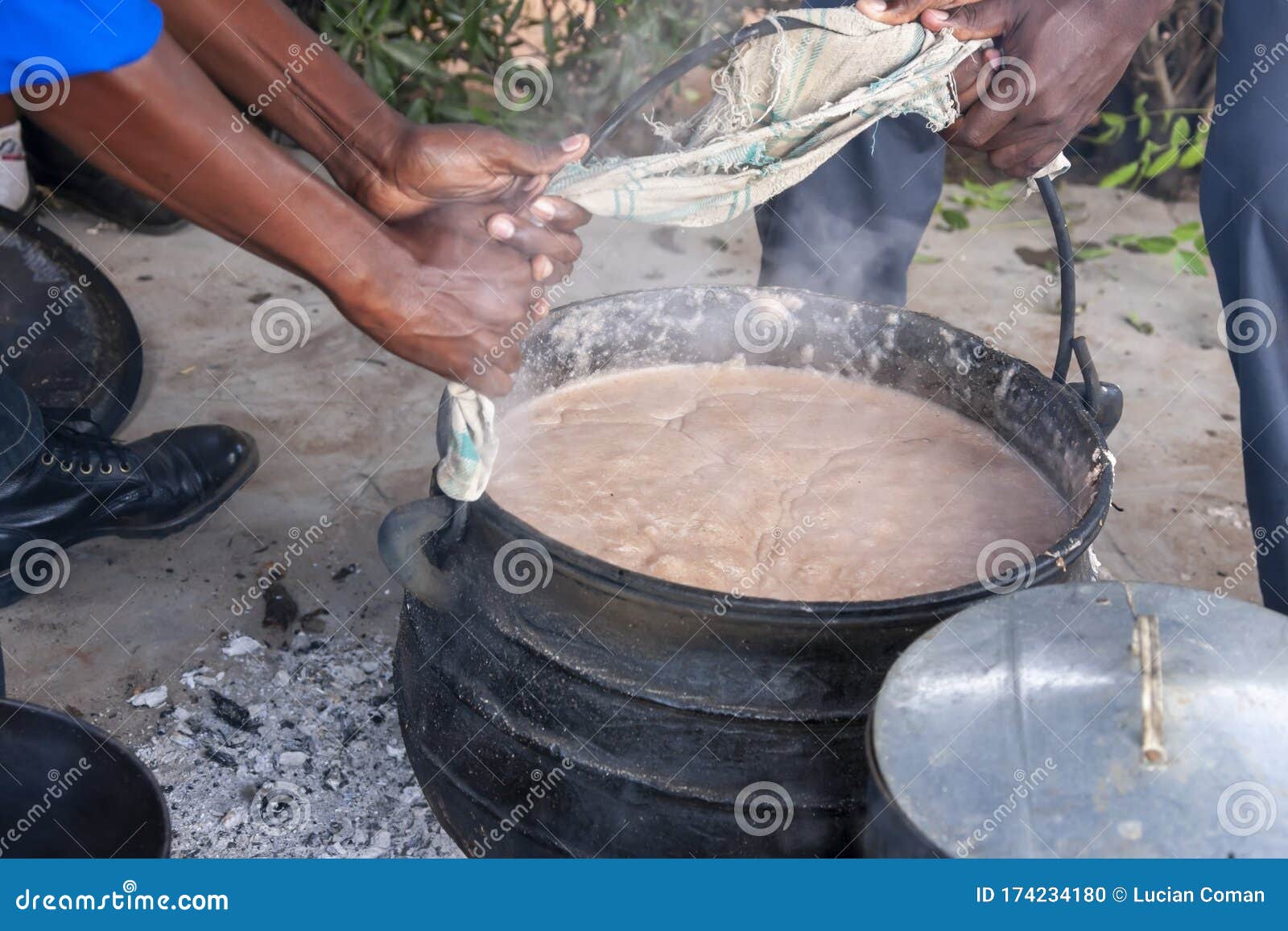 Traditional Cuisine Big Black Pot Cooking Food, Natural Fire With Wood  Heating Stock Photo, Picture and Royalty Free Image. Image 91055974.