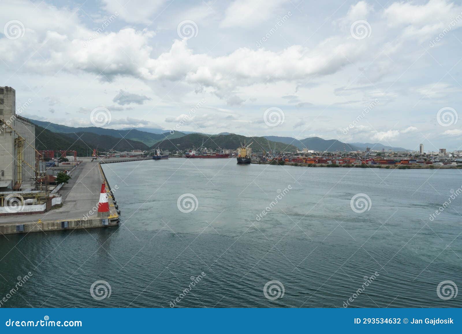 port basin of puerto cabello with moored ships in container and general cargo terminal.