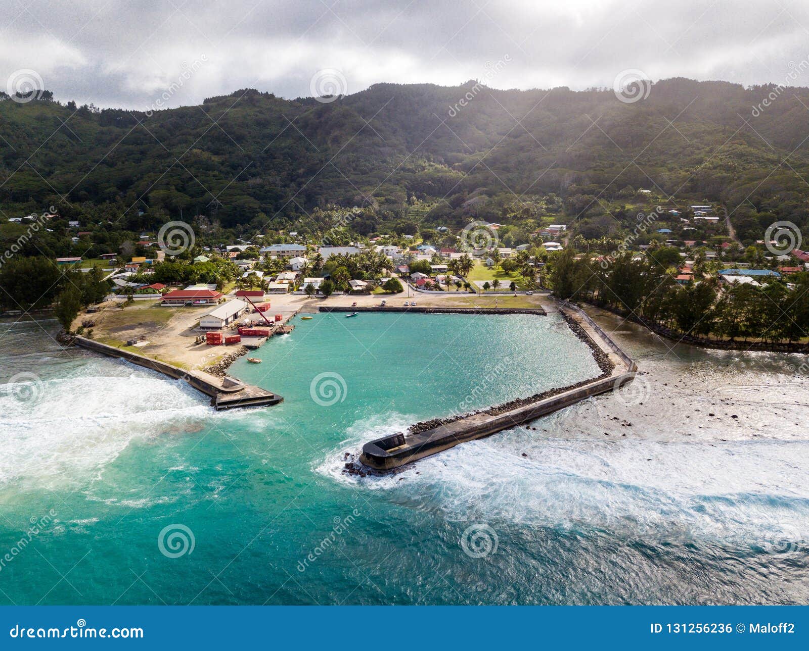 the port and village of moerai, rurutu island, austral islands tubuai islands, french polynesia. aerial view.