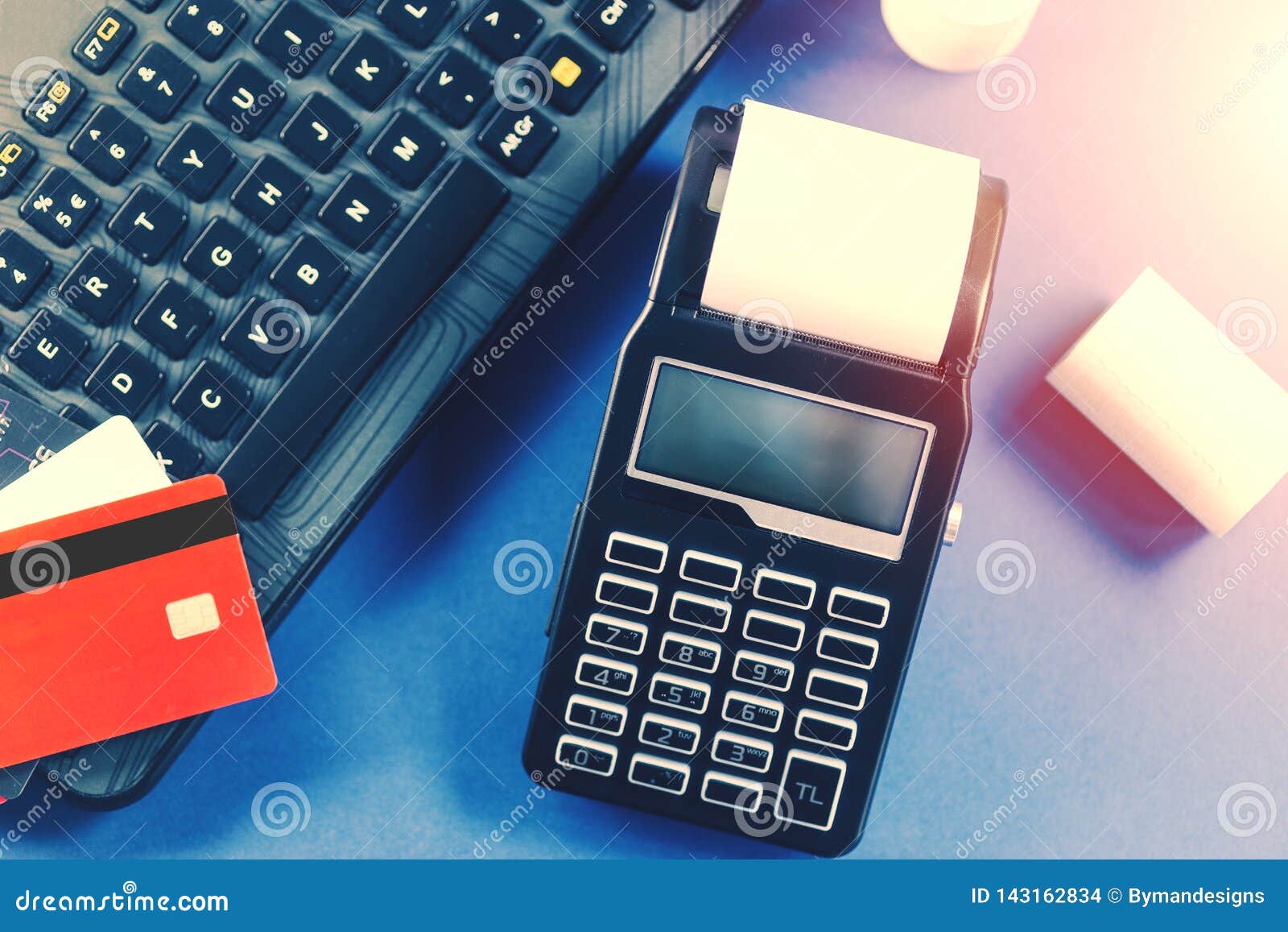 portable-cash-register-and-credit-card-on-keyboard-stock-photo-image
