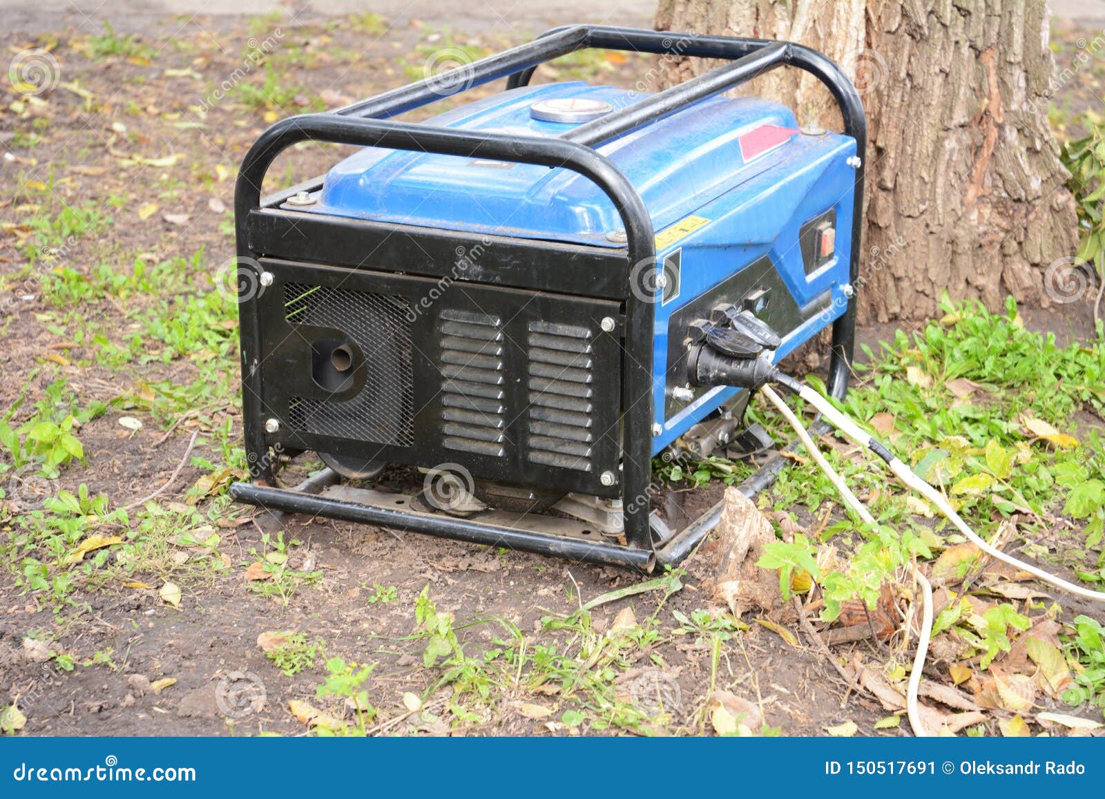 portable generator - outdoor power equipment. mobile backup power generator in the garden