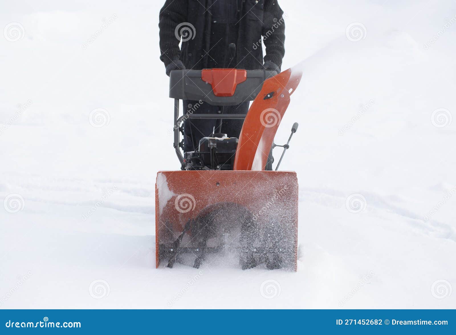 A Portable Snow Blower Powered by Gasoline. Snow Removal in Winter