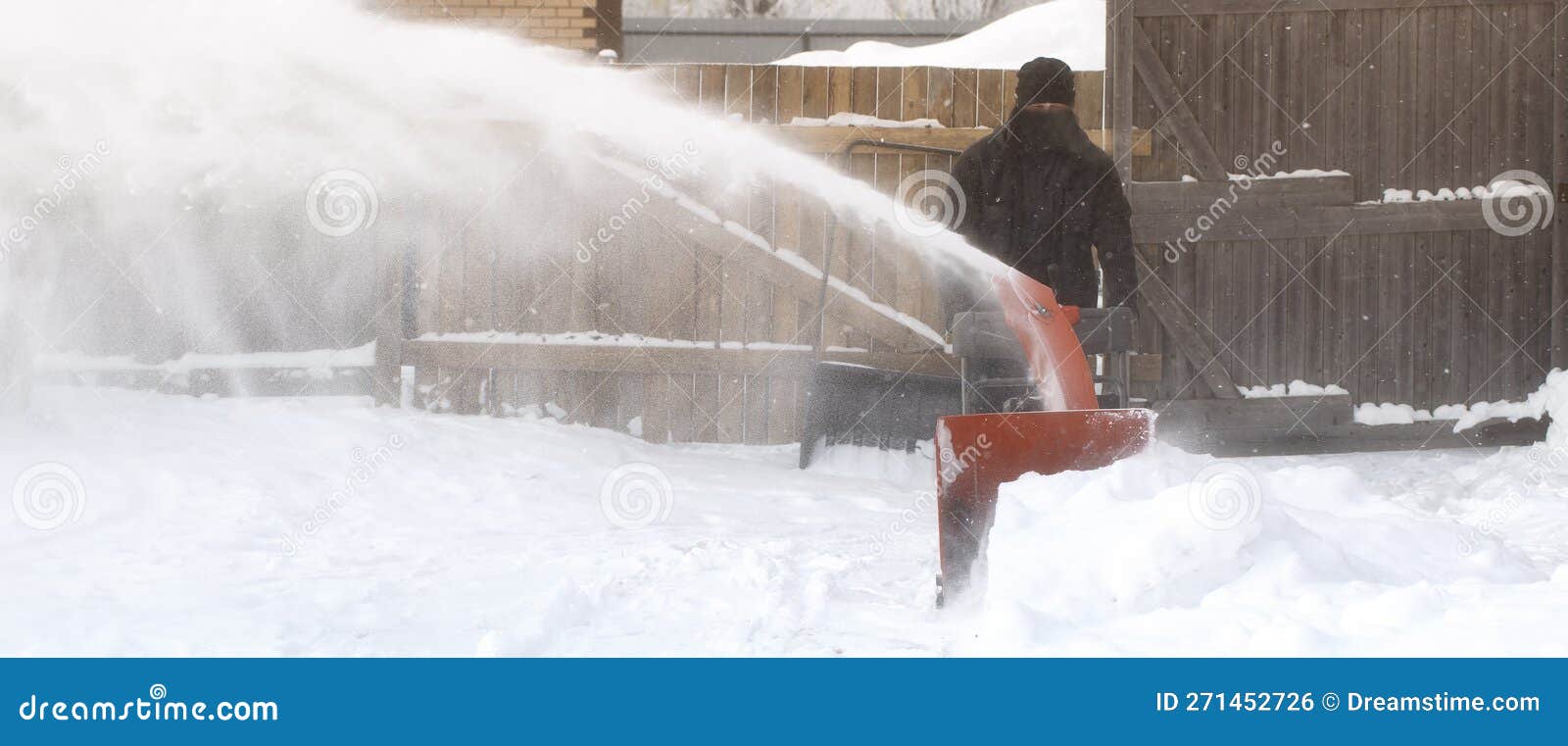 A Portable Snow Blower Powered by Gasoline. Snow Removal in Winter