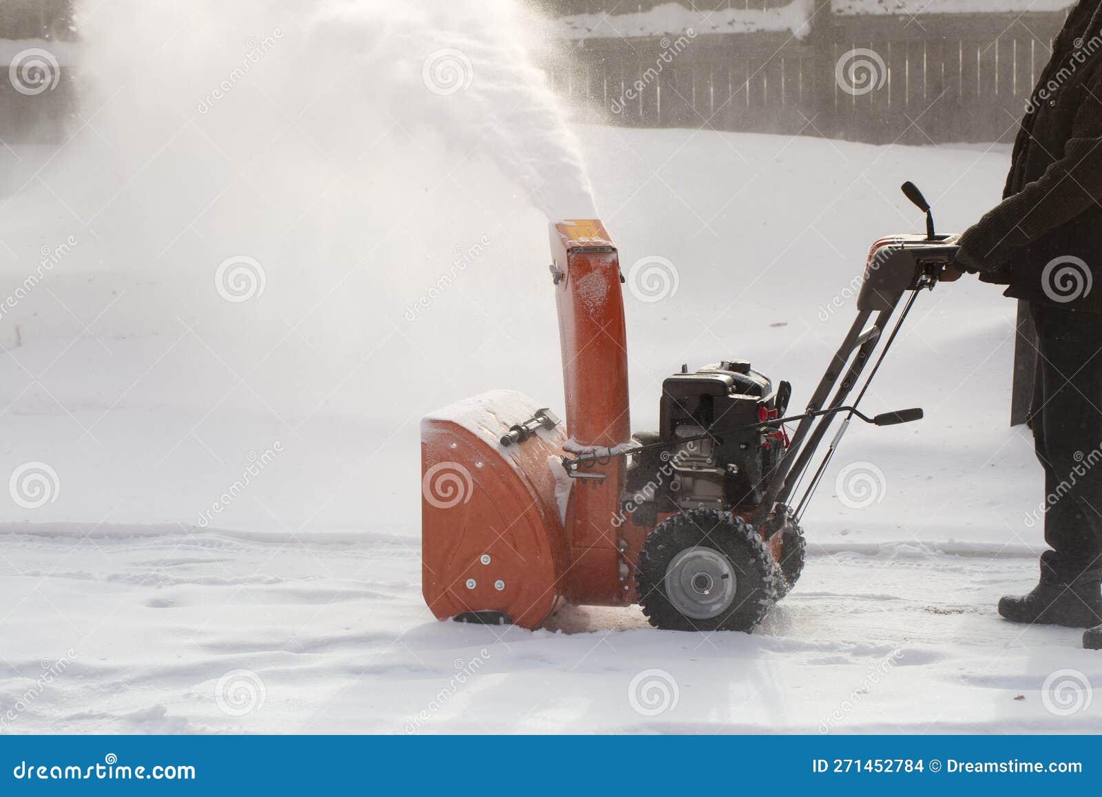 A Portable Snow Blower Powered by Gasoline. Snow Removal in Winter