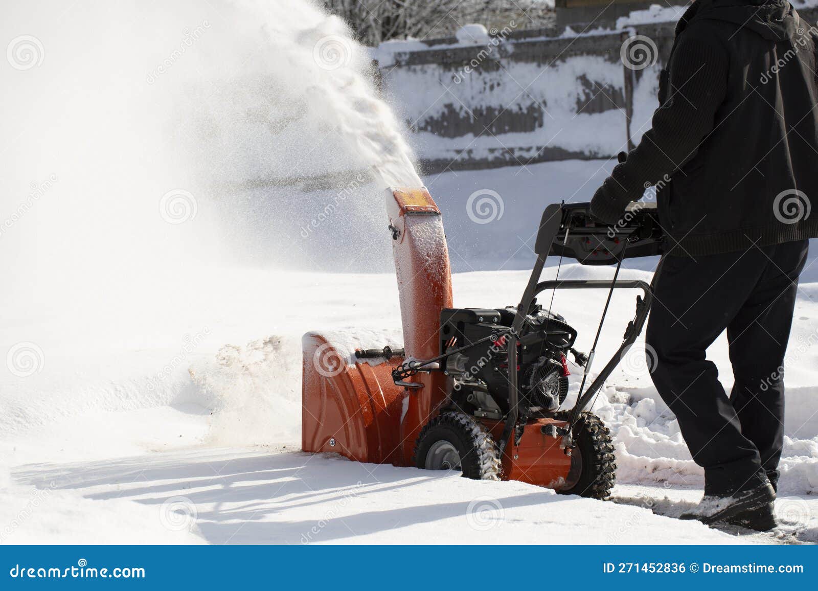 A Portable Snow Blower Powered by Gasoline. Snow Removal in Winter