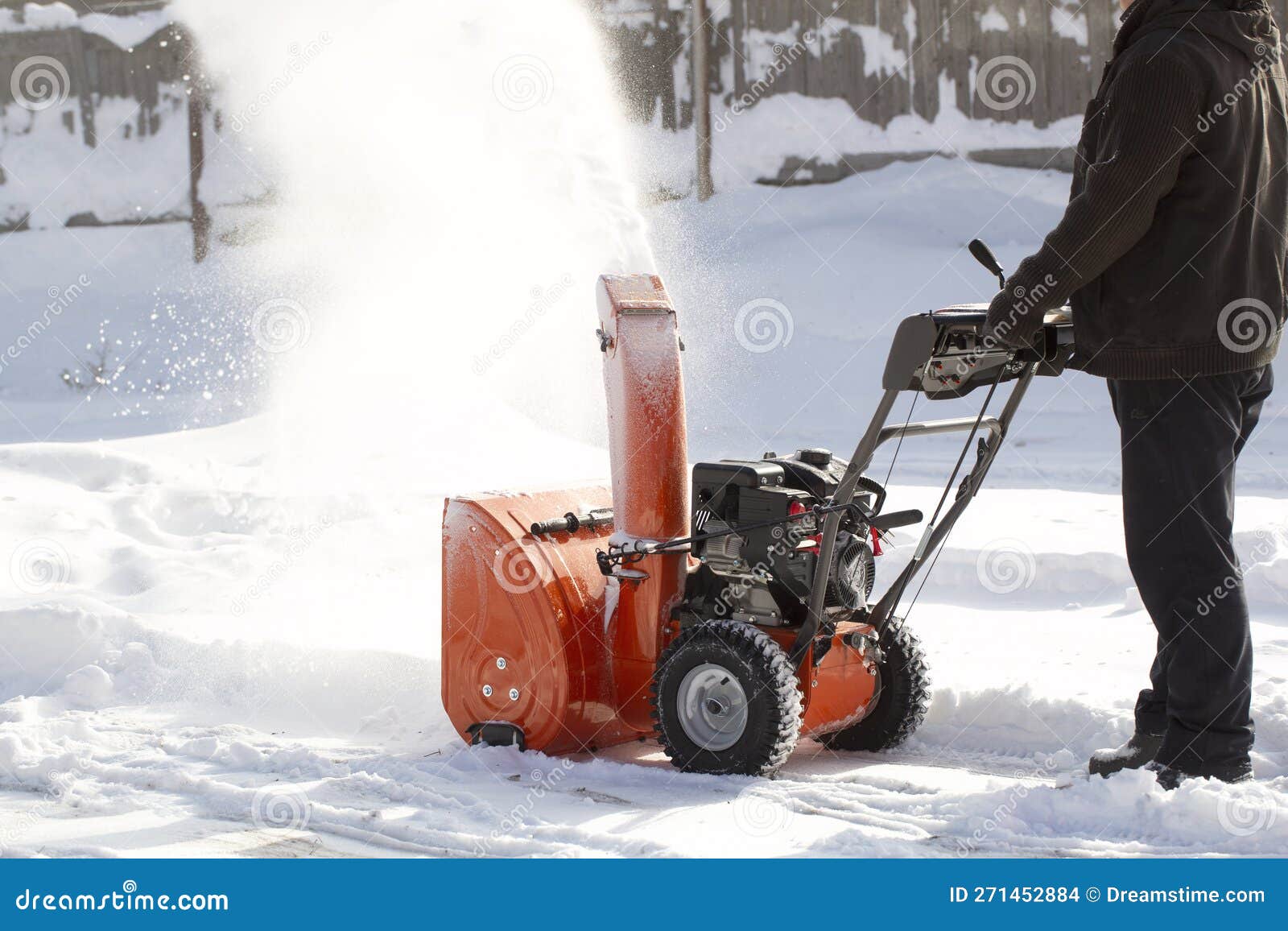 A Portable Snow Blower Powered by Gasoline. Snow Removal in Winter