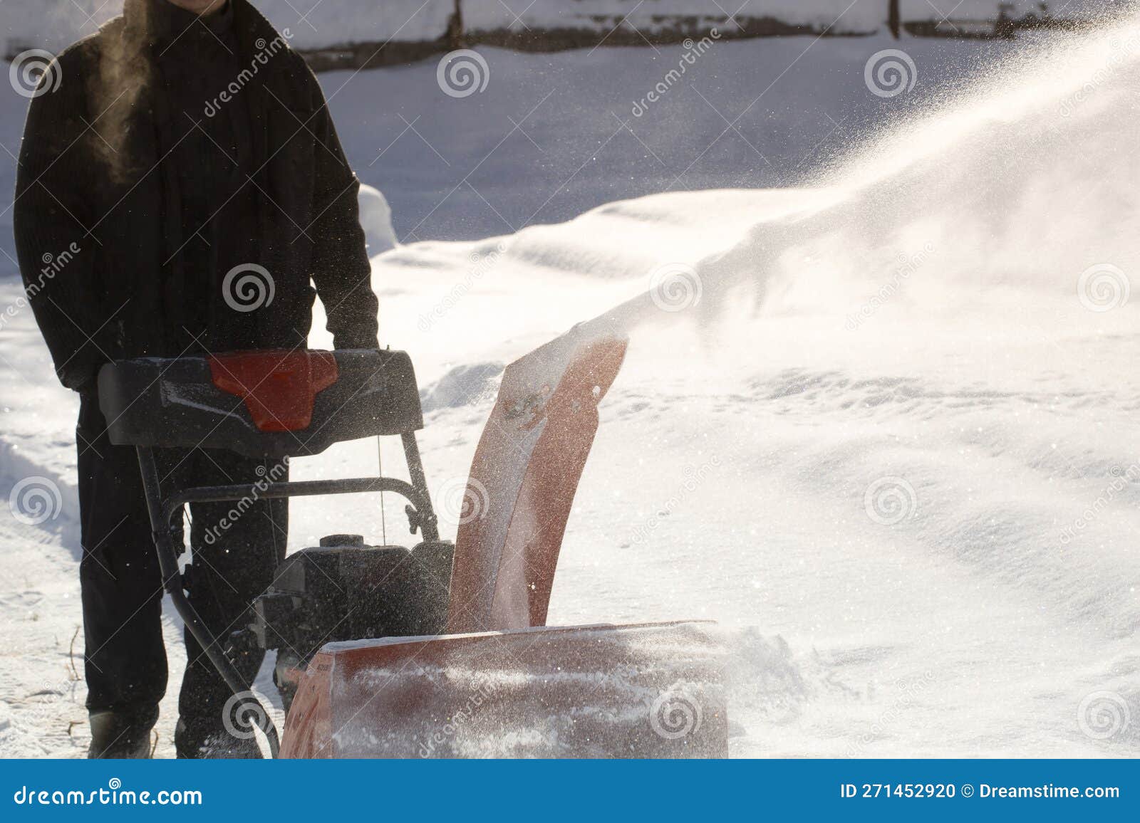 A Portable Snow Blower Powered by Gasoline. Snow Removal in Winter