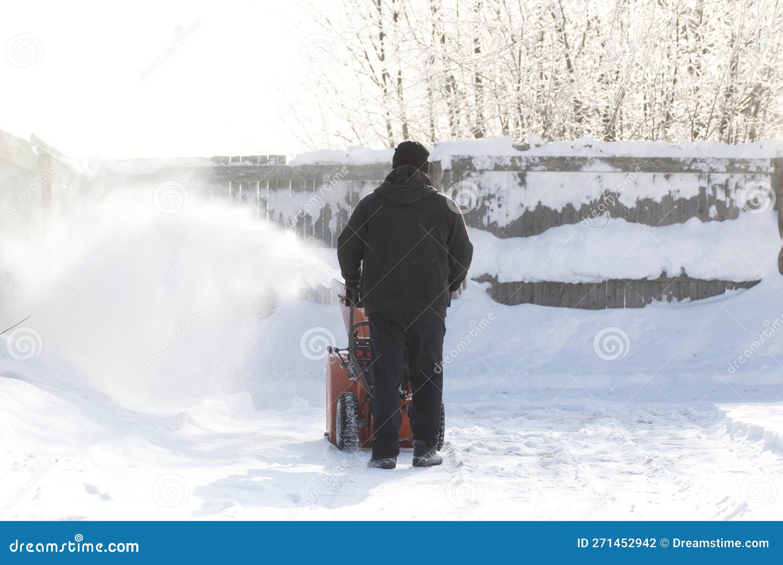A Portable Snow Blower Powered by Gasoline. Snow Removal in Winter