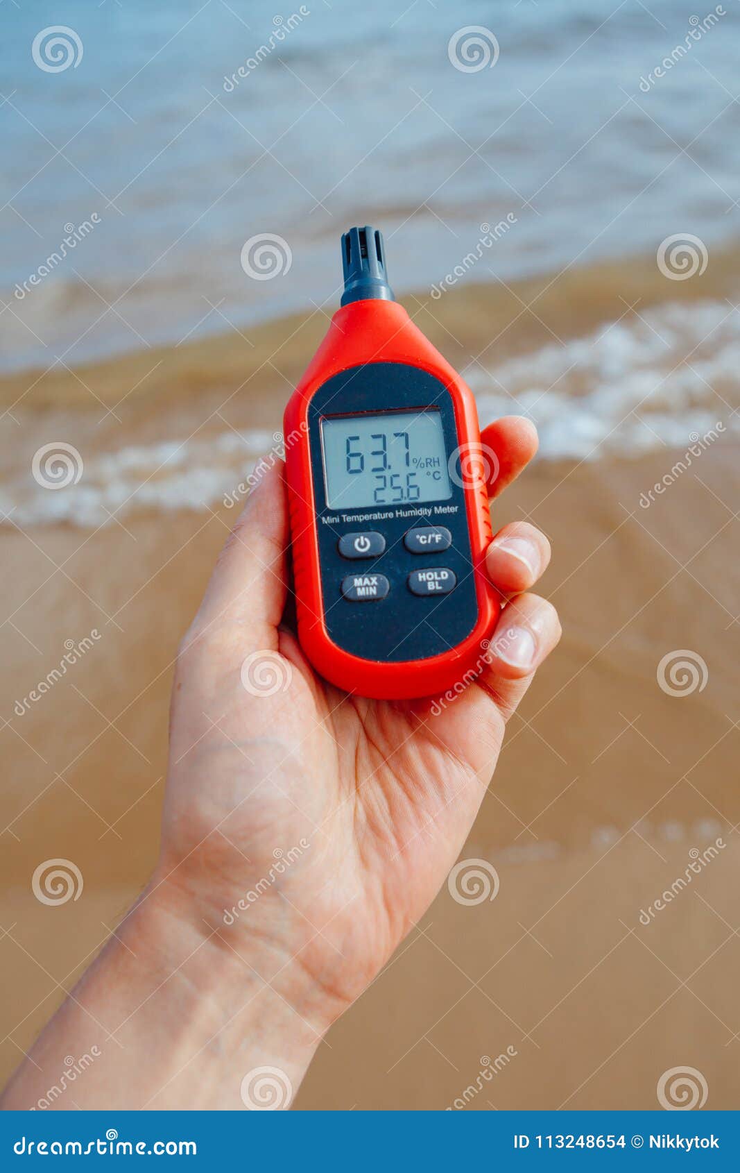 Portable Thermometer in Hand Measuring Outdoor Air Temperature and Humidity  Stock Photo - Image of instrument, meter: 113248654