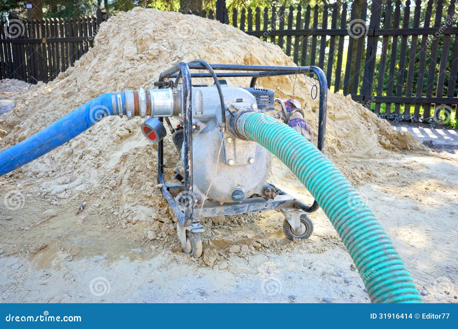 Portable water pump device stock photo. Image of pump 31916414