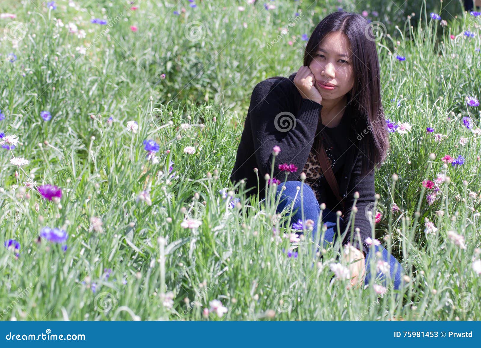 portarit thai woman with purple flower garden
