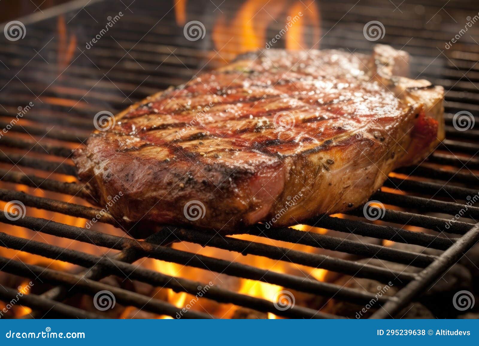 Porterhouse Steak on a Grill with Coal Underneath Stock Photo Image