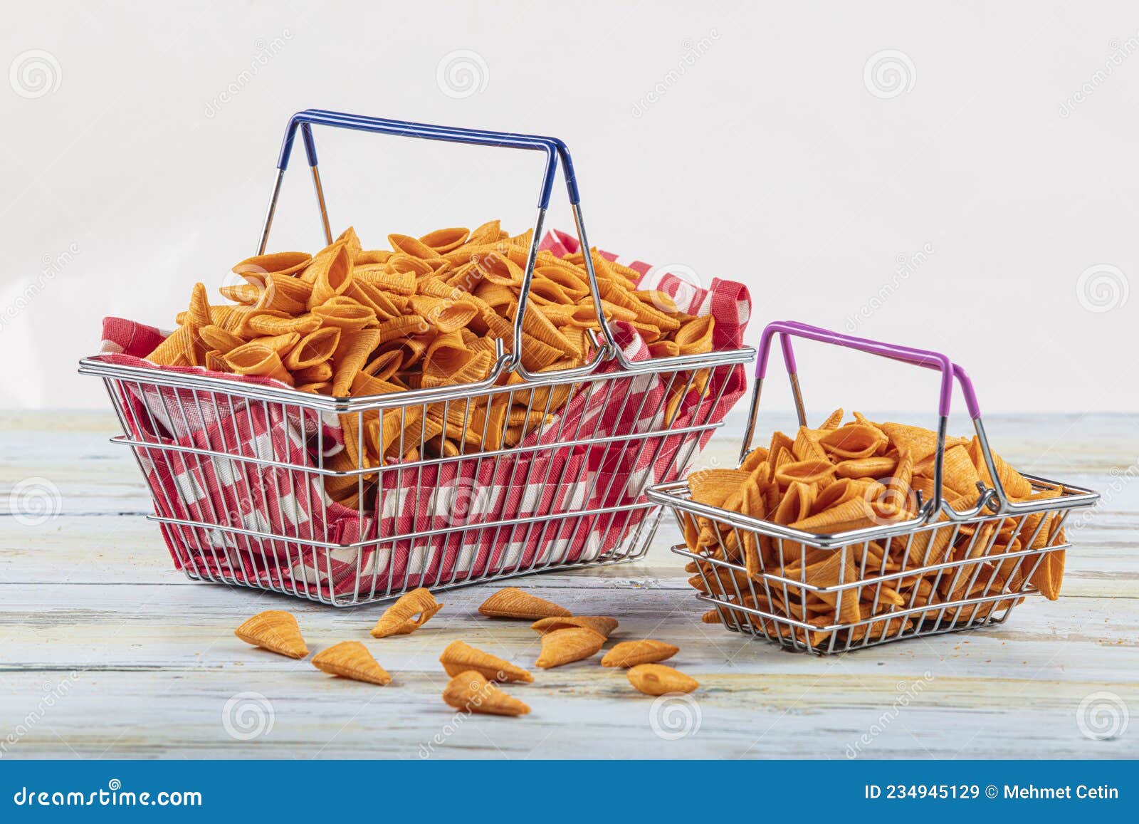 Portion of Cone Shaped Snack Tornado Shaped Crackers. Yellow Spicy