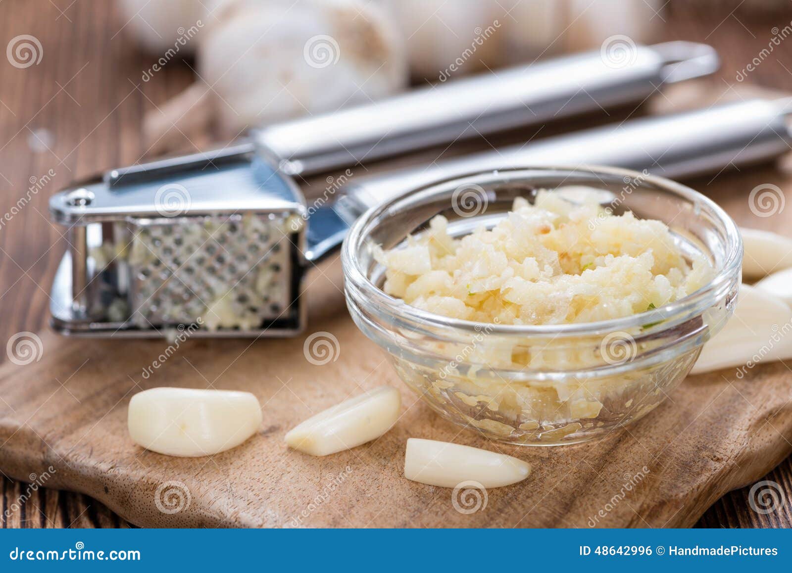Portion of Crushed Garlic stock photo. Image of equipment 48642996