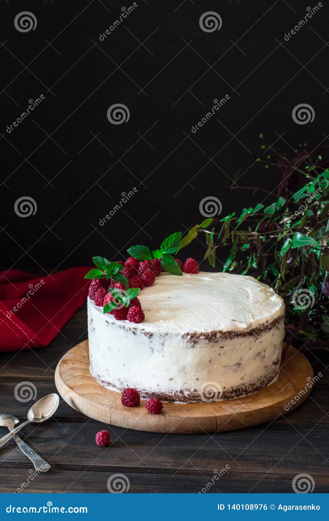 Portion Of Layered Creamy Fruit Cake With In Close Up View