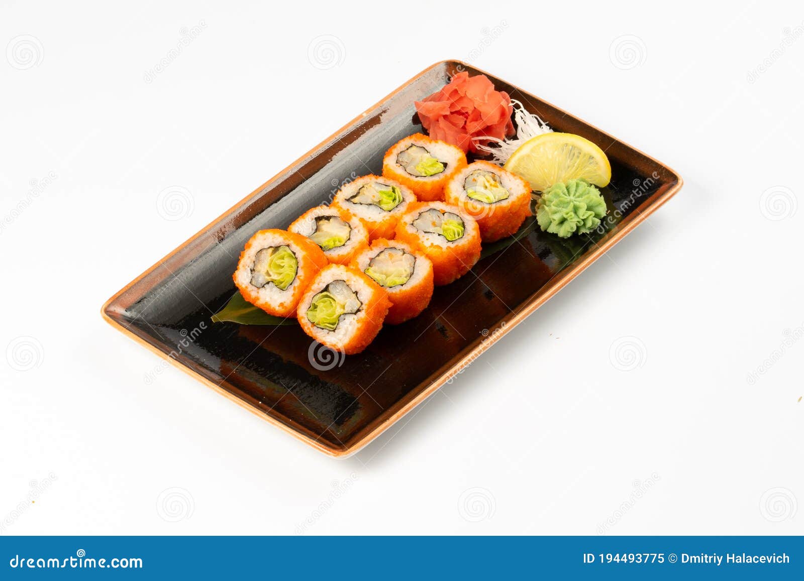 A Portion of Maki Sushi with an Assortment of Japanese Side Dishes in a