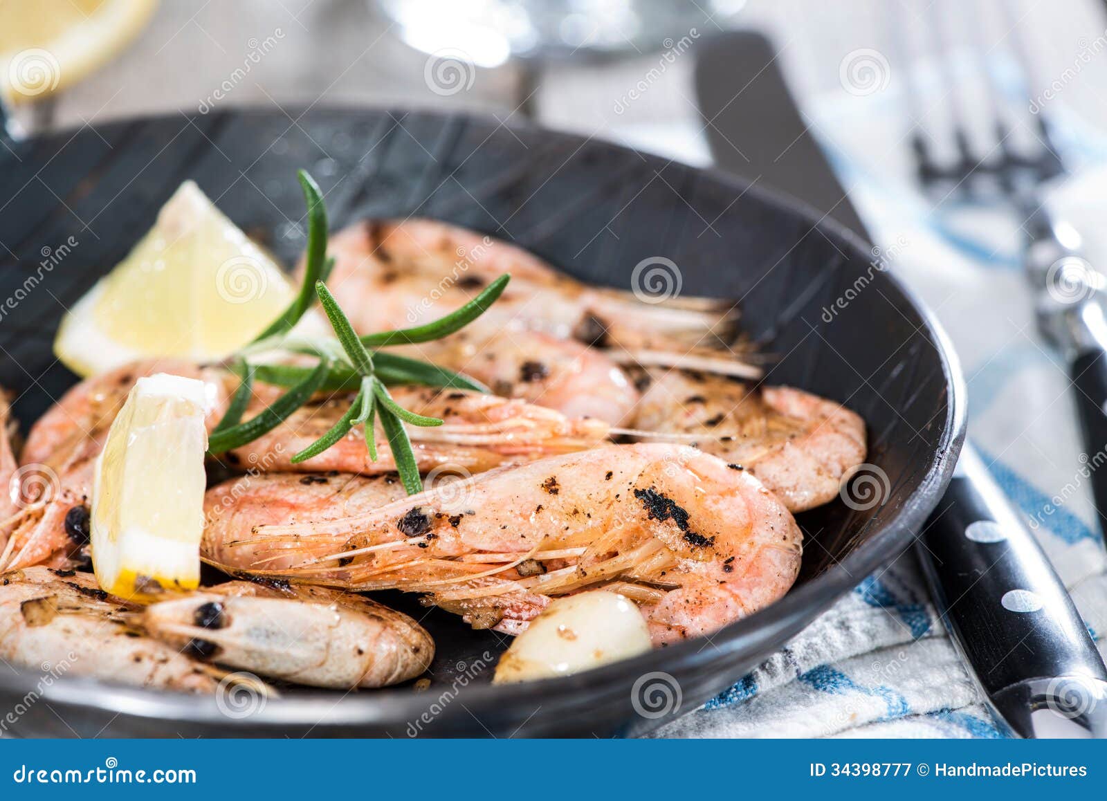 Portion of Shrimps in a pan. Portion of fresh fried Shrimps in a vintage pan