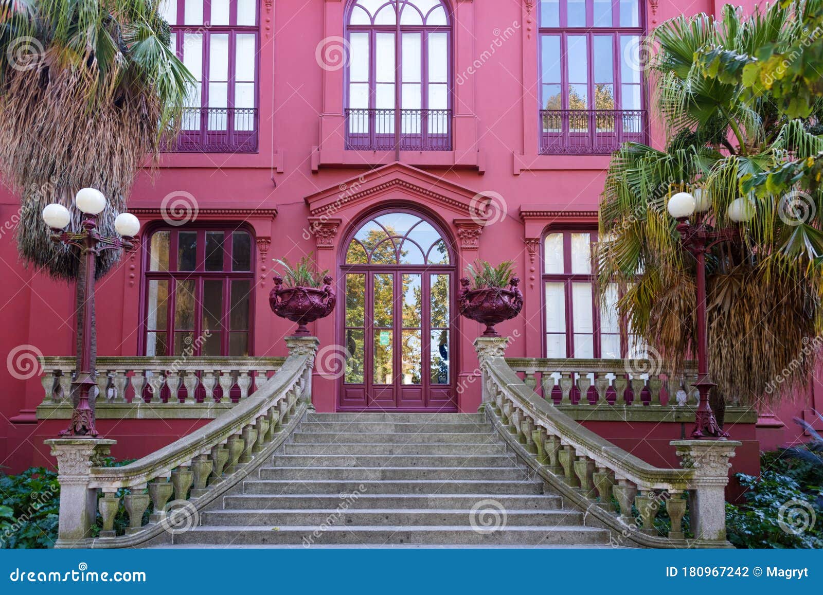 porto botanical garden. main entrance, pink facade of casa andresen, porto, portugal