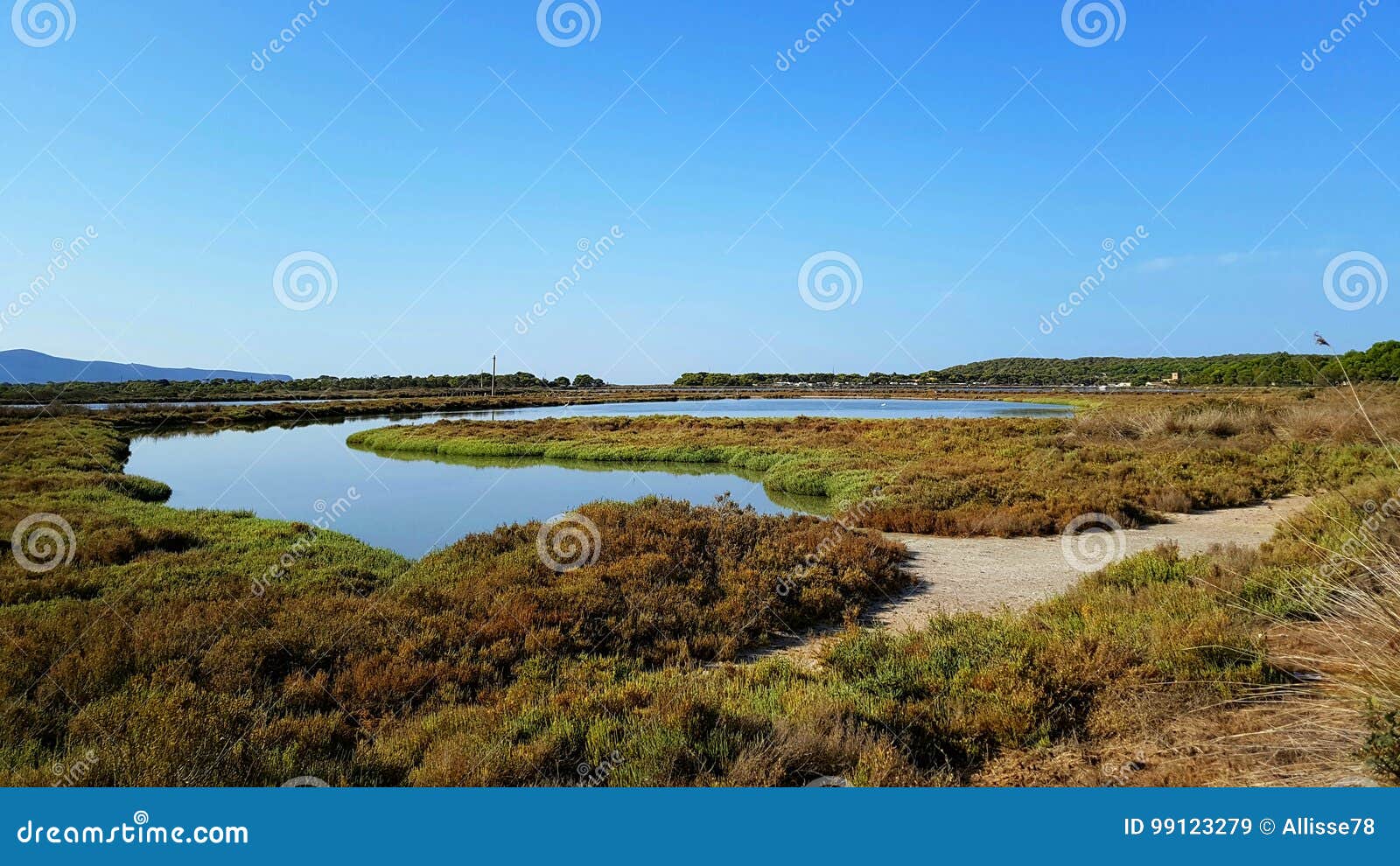 porto pino pond panoramic view. sardinia, italy