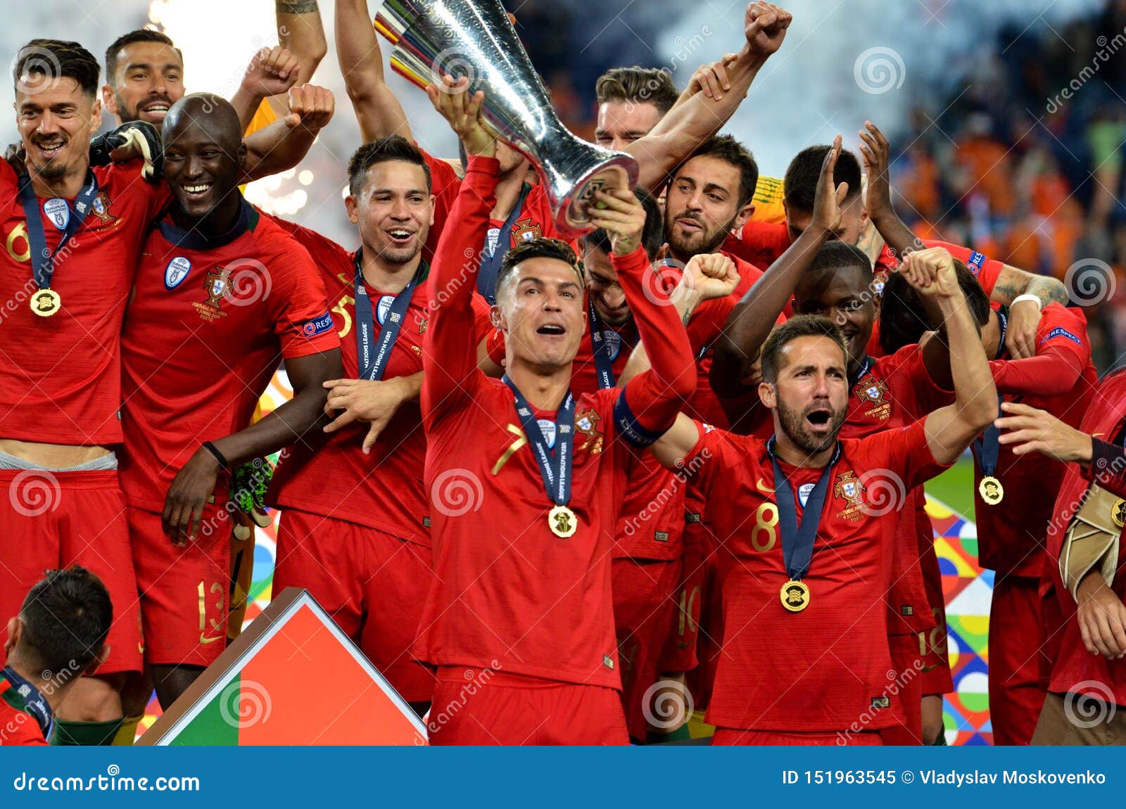 Porto players celebrate as they lift the trophy after beating