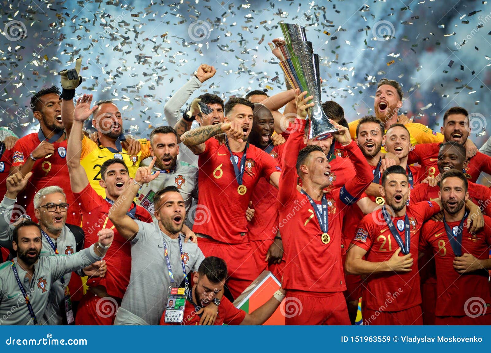 Porto players celebrate as they lift the trophy after beating