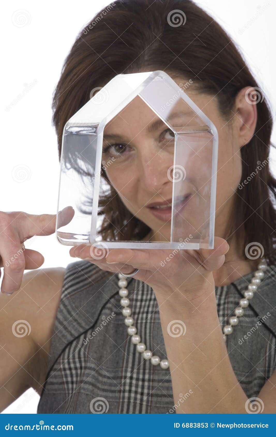 portrait of 40s woman with a transparent house