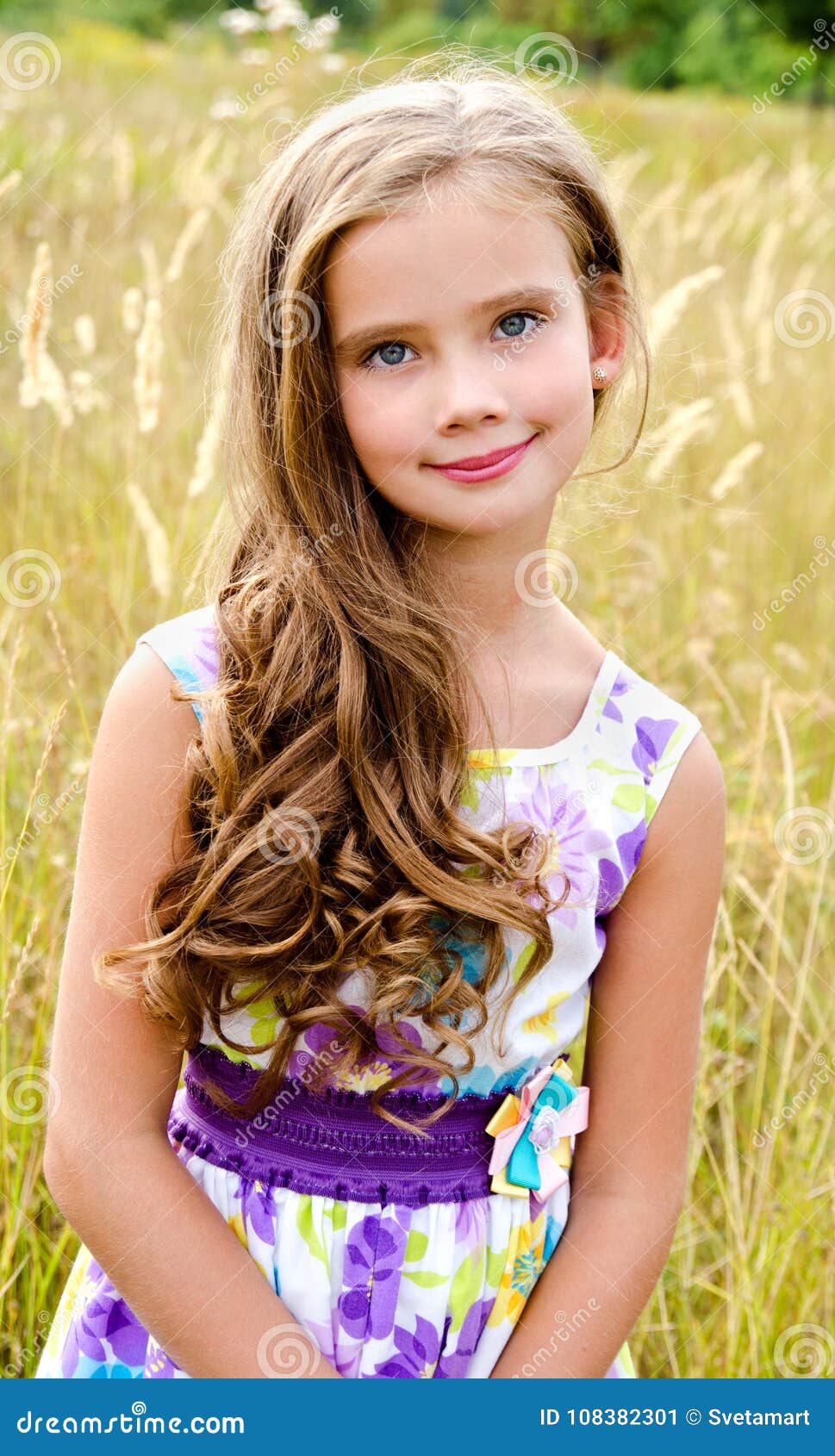 Portrait of Adorable Smiling Little Girl on the Meadow in Summe Stock ...