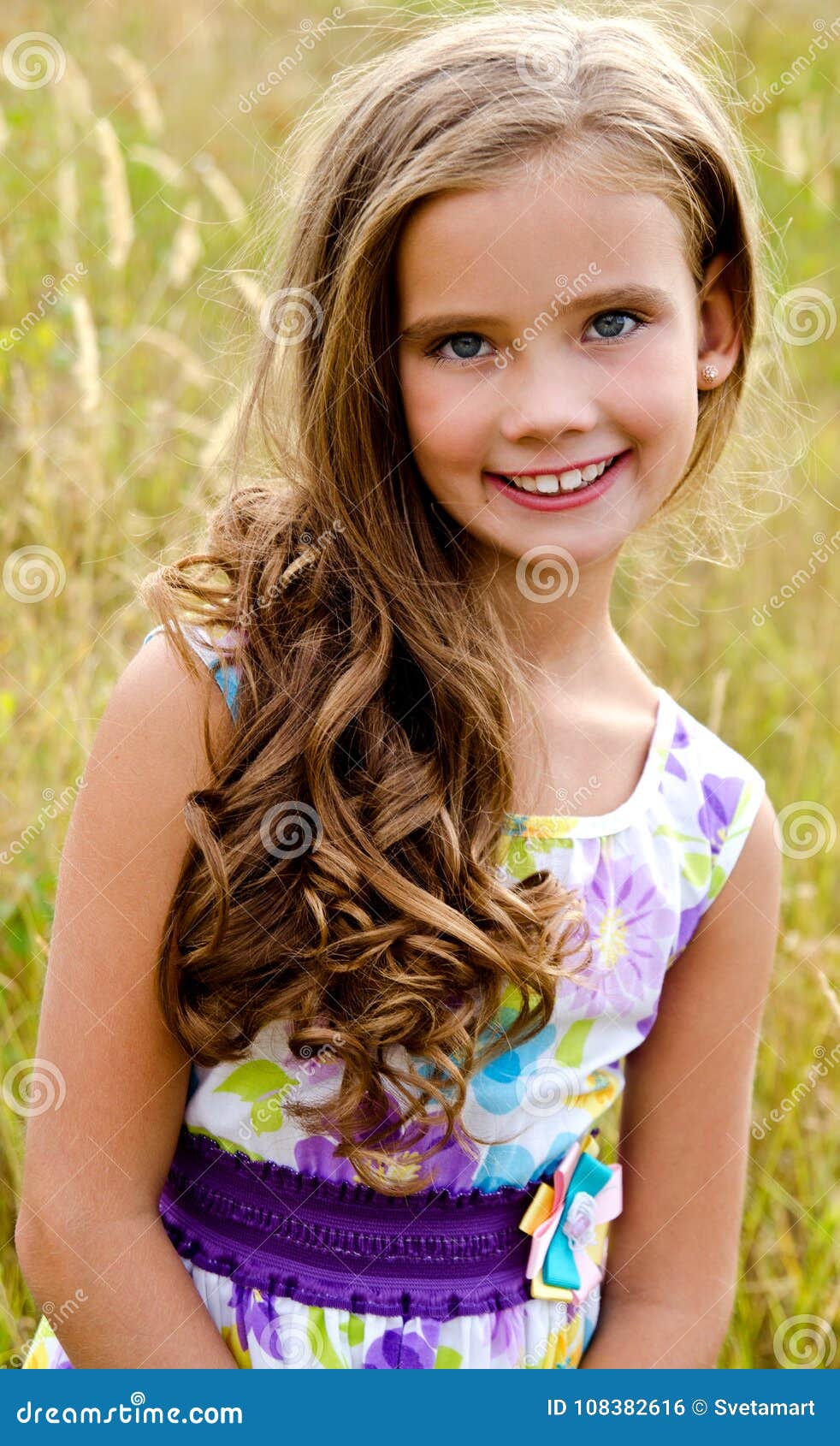 Portrait of Adorable Smiling Little Girl on the Meadow in Summe Stock ...