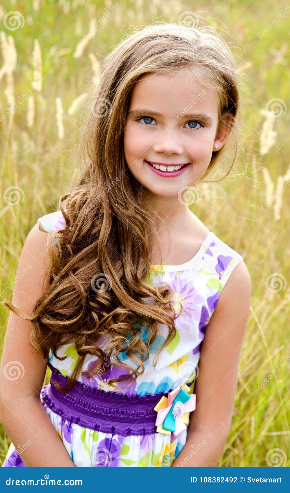 Portrait of Adorable Smiling Little Girl on the Meadow in Summe Stock ...