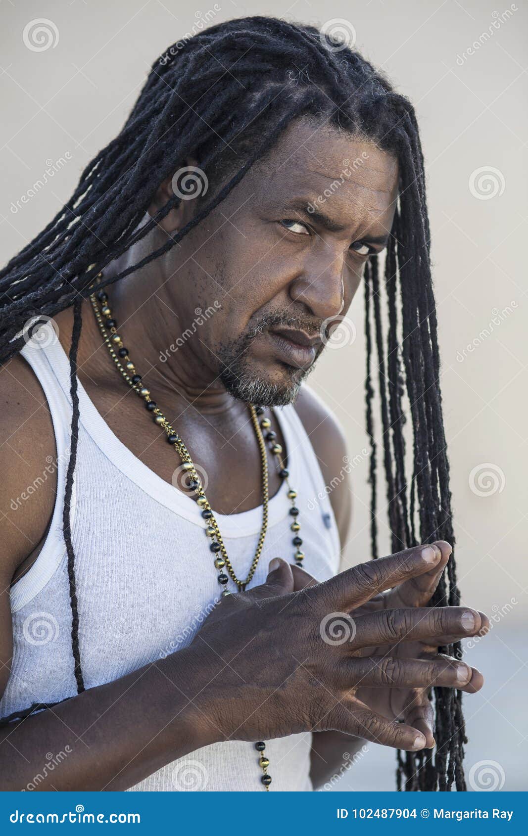 Portrait Of Adult Strong Black Men With Long Dreadlocks And