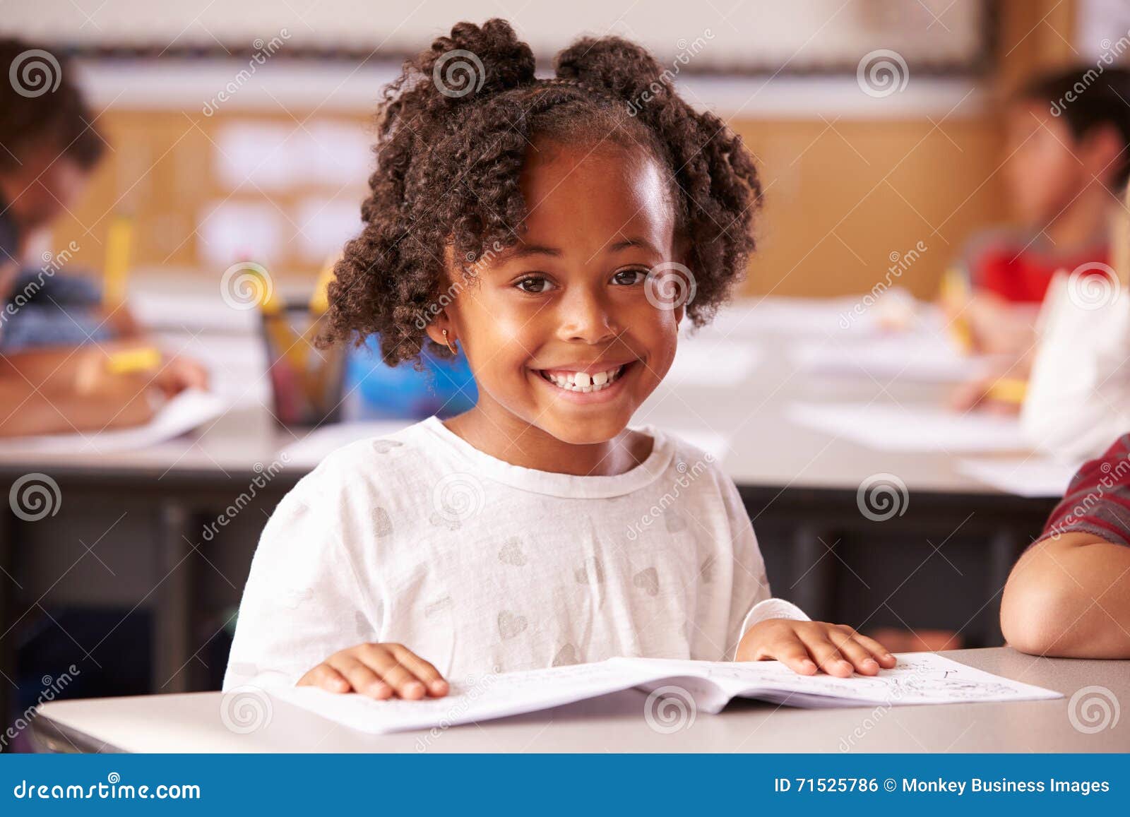 portrait of african american ary school girl in class