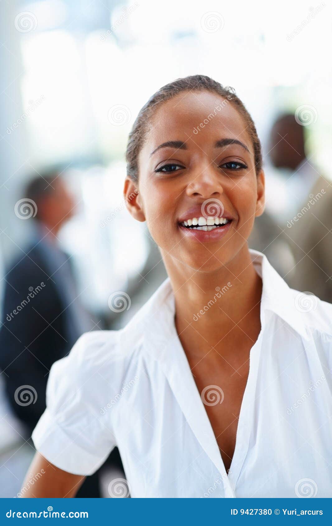 Portrait of an African American woman smiling. Portrait of a successful happy African American woman, smiling