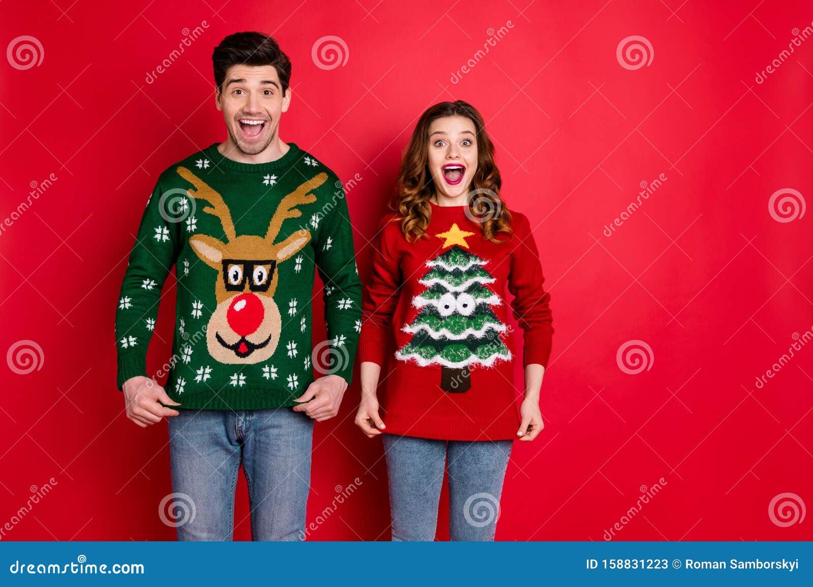 portrait of astonished two people wife with brunette hair scream wow enjoy deer christmas pattern fashion jumper wear