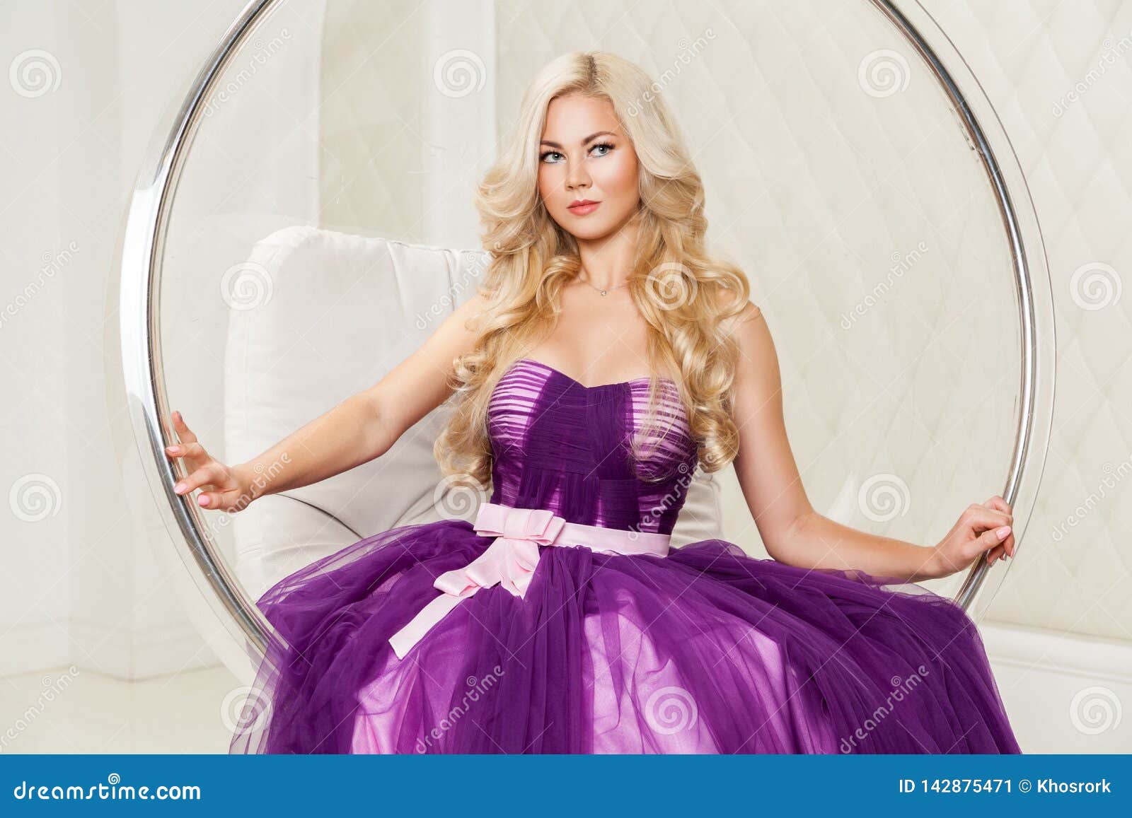 Portrait Of Attractive Blonde Elegance Woman In Fashionable Purple