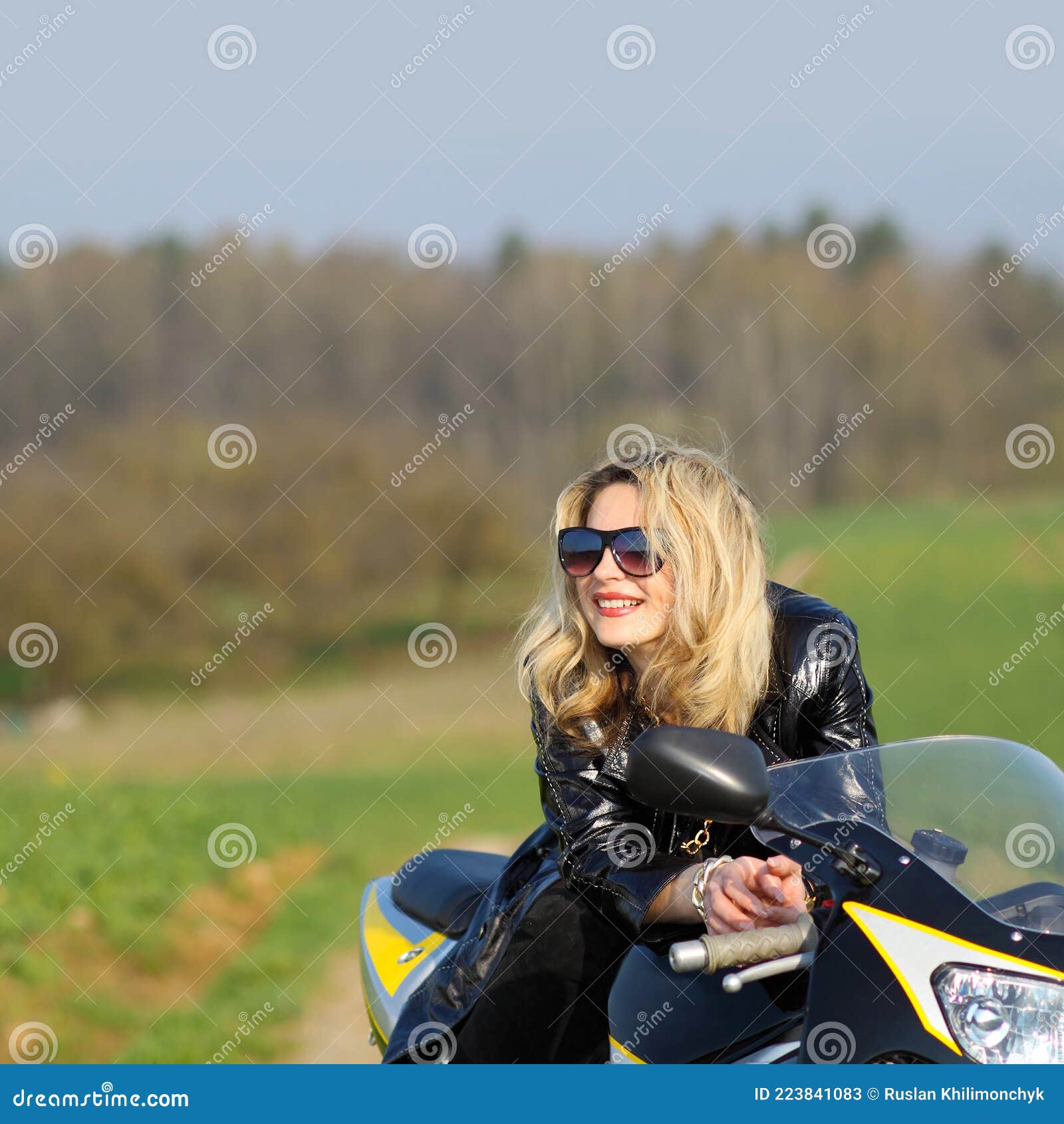 Portrait of a Beautiful Blonde Woman on a Sports Motorcycle Stock Image ...
