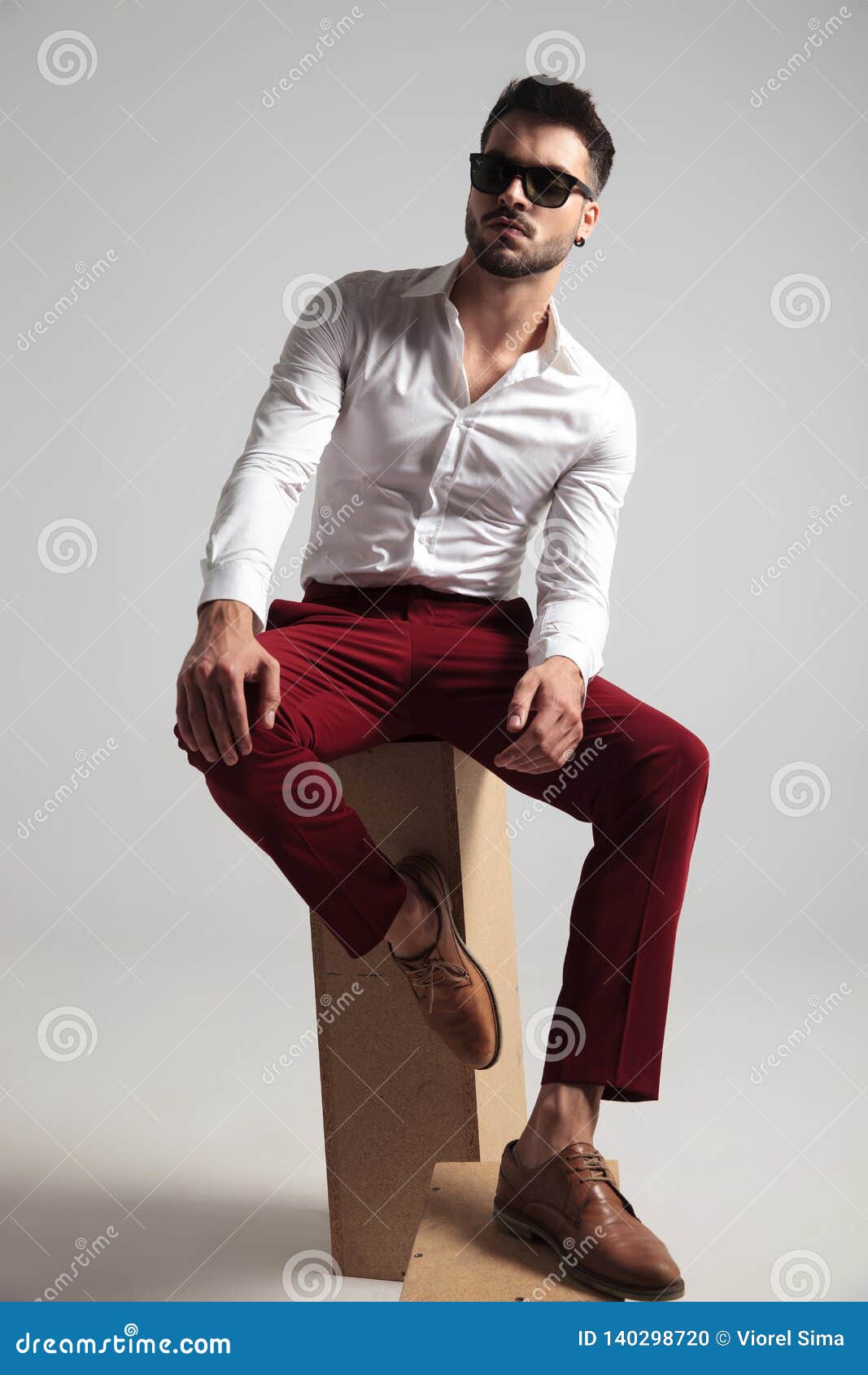 portrait attractive man wearing unbuttoned shirt posing gray background attractive man wearing unbuttoned shirt poses 140298720