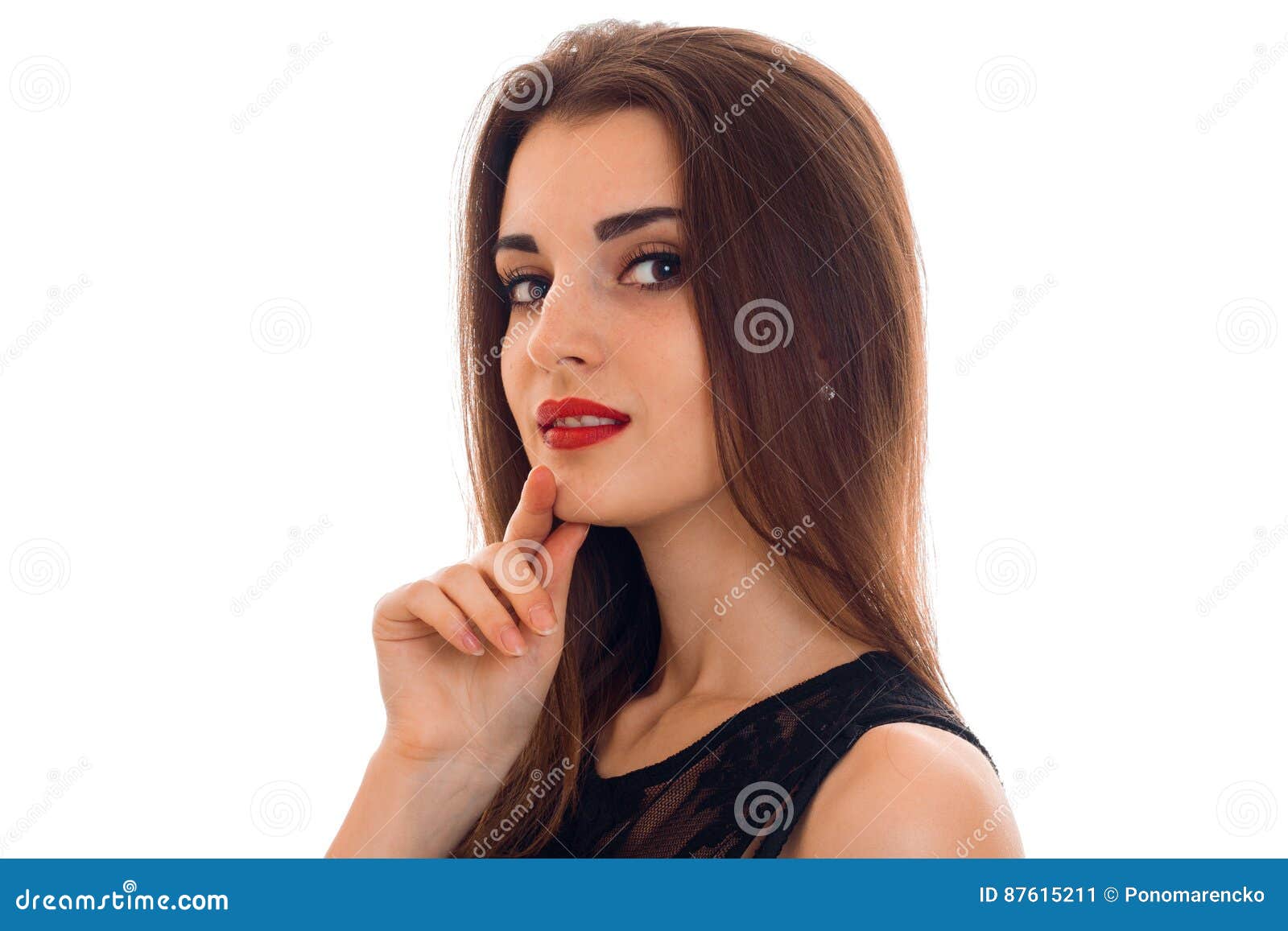 Portrait of an Attractive Young Girl with Red Lipstick that Looks into ...