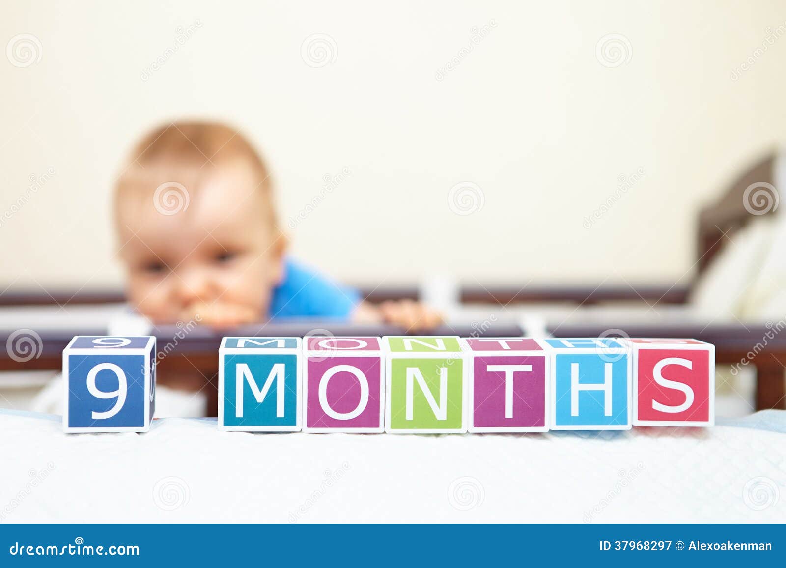 Portrait of Baby Boy in Bed. Age Concept. Stock Image Image of colors