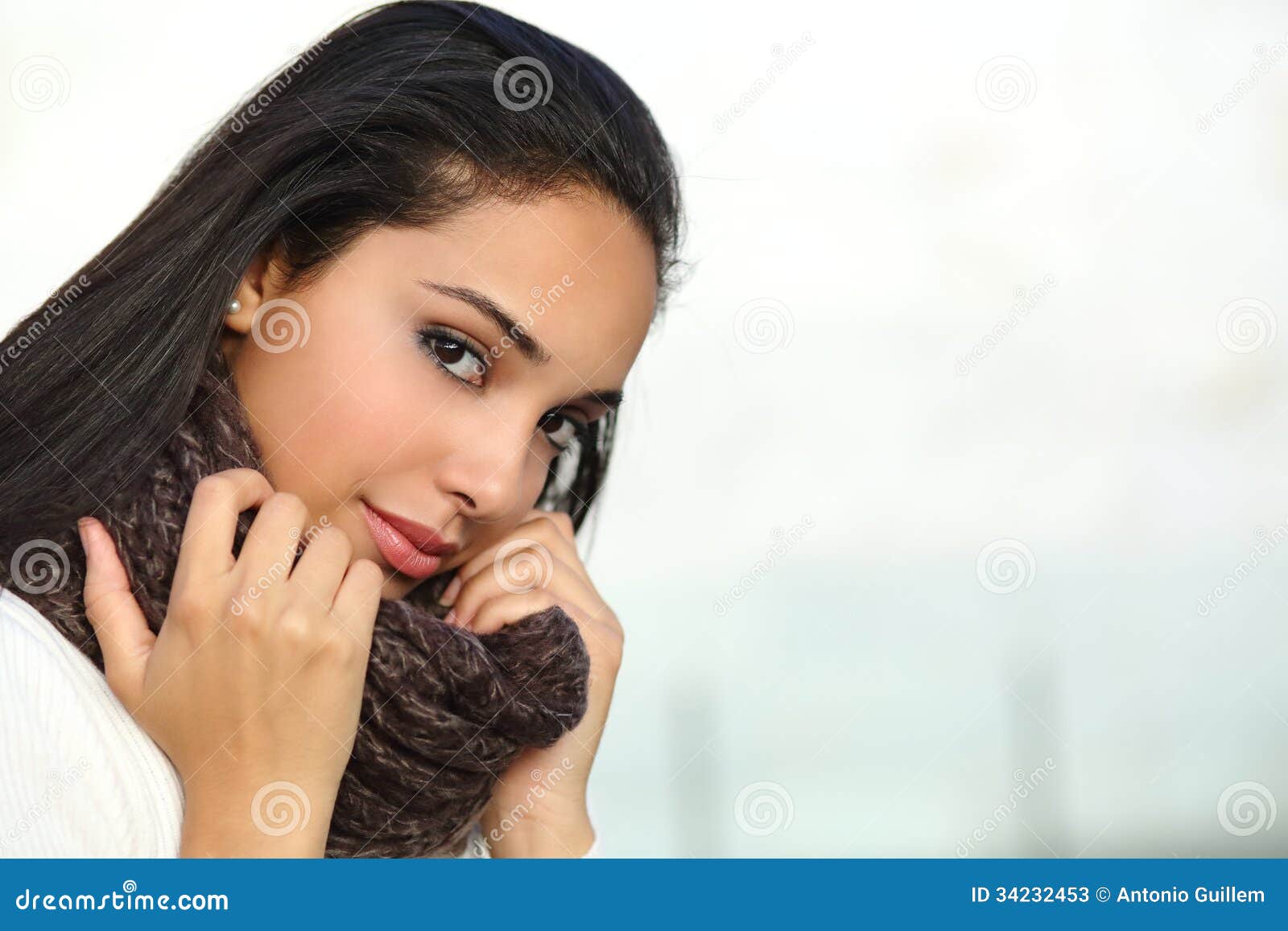 portrait of a beautiful arab woman face warmly clothed