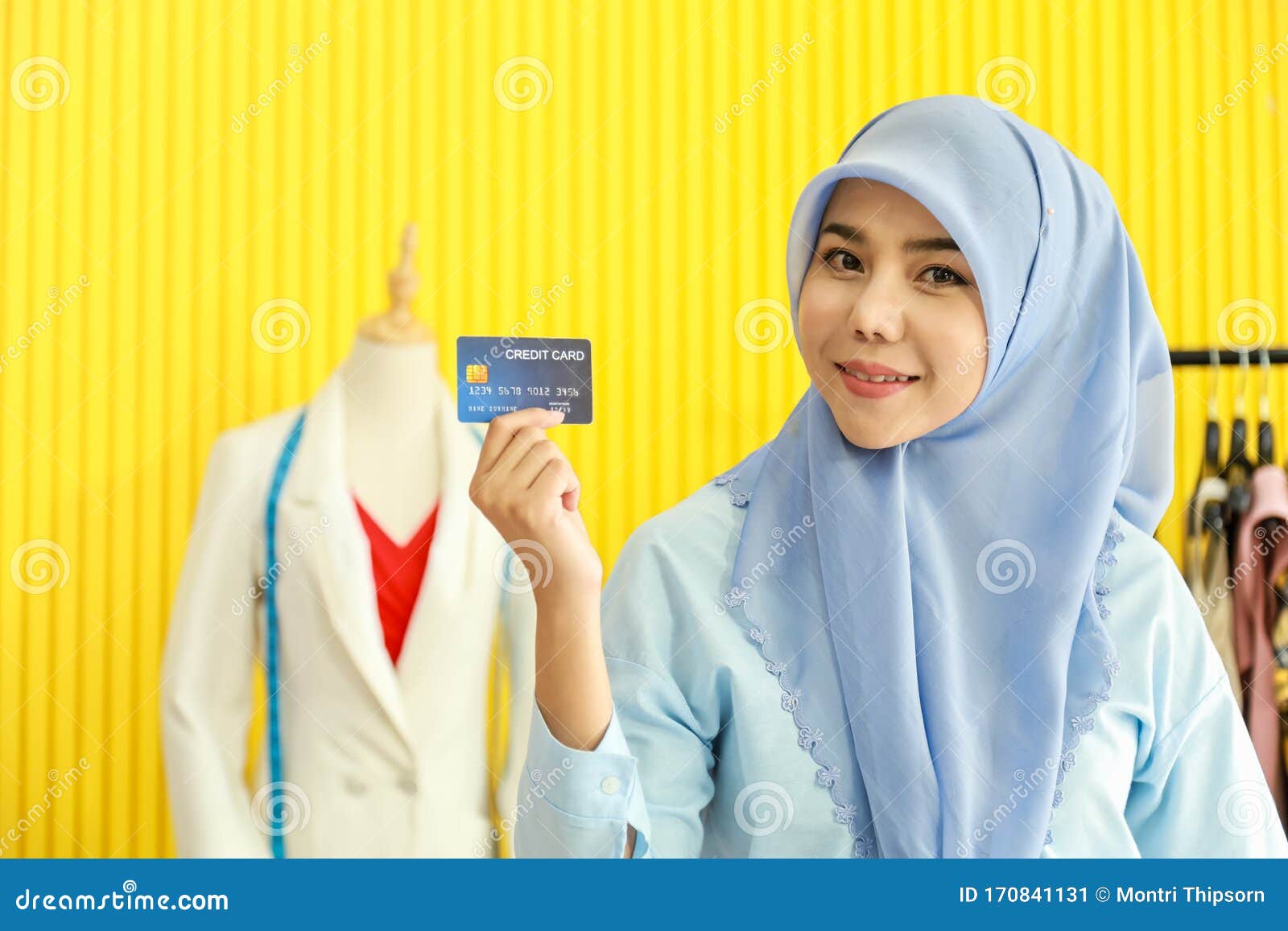 Download Portrait Of Beautiful Asian Muslim Woman Designer With Hijab Holding Mockup Fake Credit Card In ...